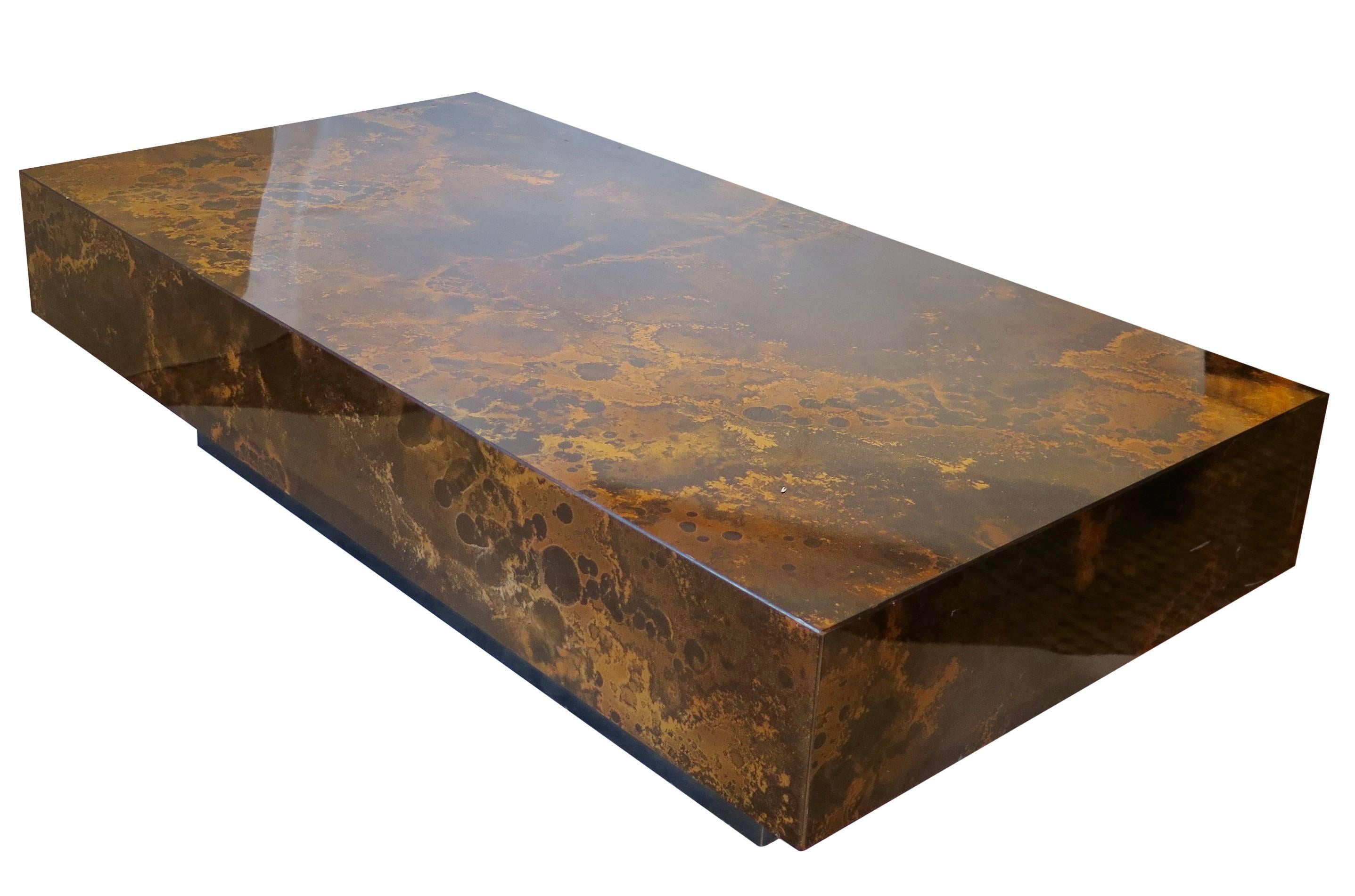 Beautiful Italian cocktail table with brown and gold faux parchment. Beautiful tones.