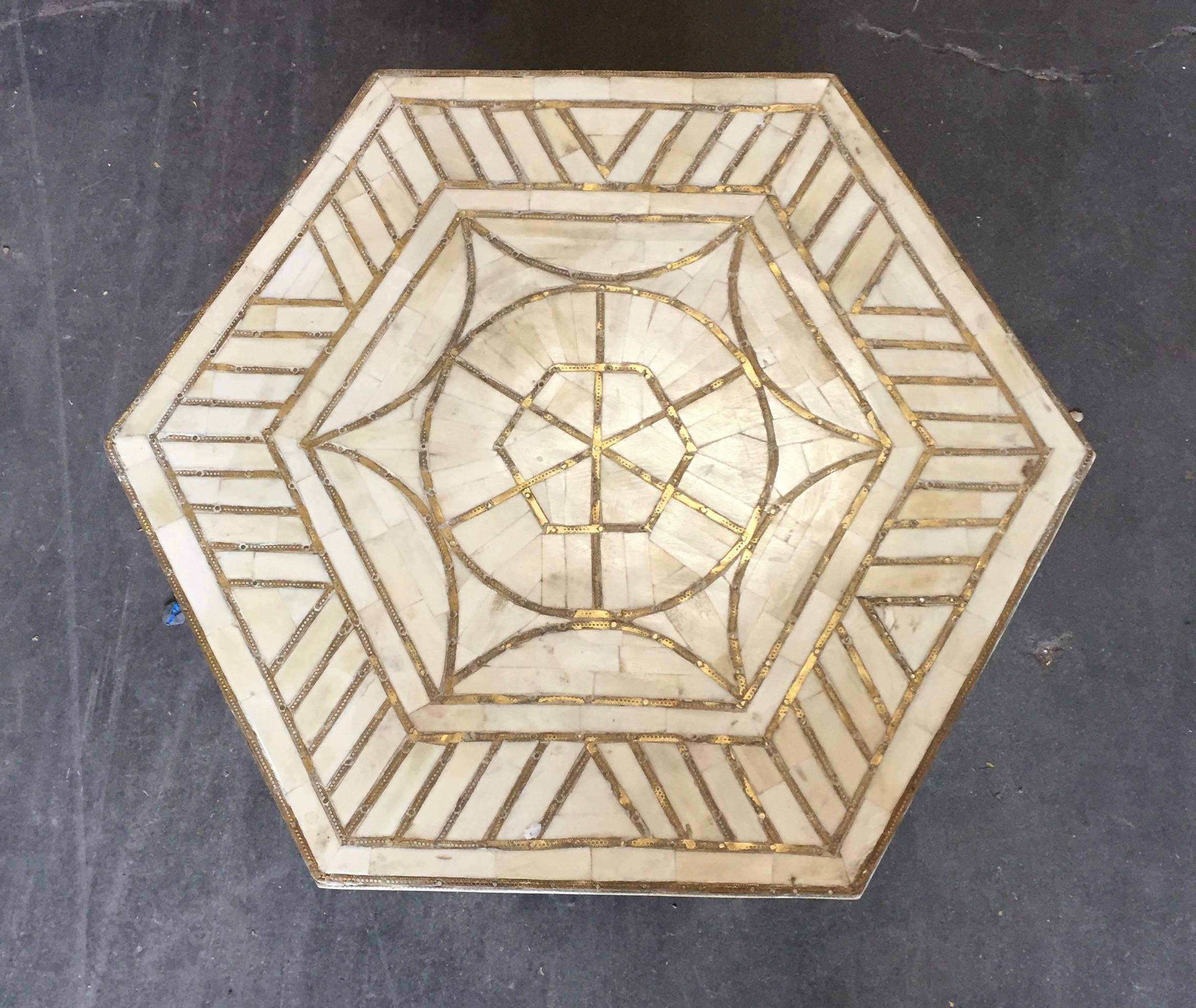Bone and brass inlay side table with brass inlay in geometric designs. This is the smaller size. Pair available.