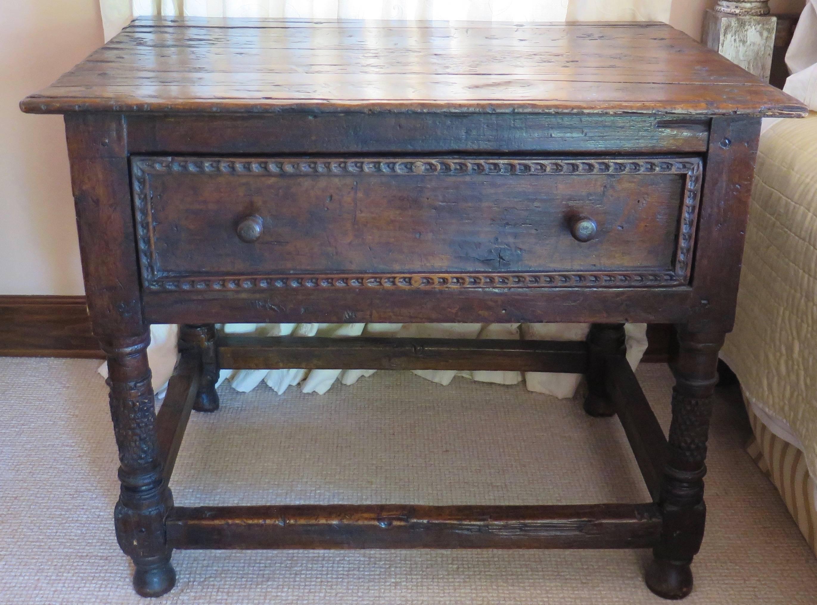 Beautiful early Spanish Colonial table with carved details.
