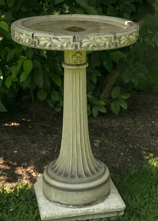 Welcome Your Birds Back. A glazed stoneware birdbath, with fluted rising baluster and round bowl ornamented with oak leaves, by English stoneware maker, LEFCO, the Leeds Fire Clay Company Ltd. (their product line was called “Lefcoware”).  

LEFCO