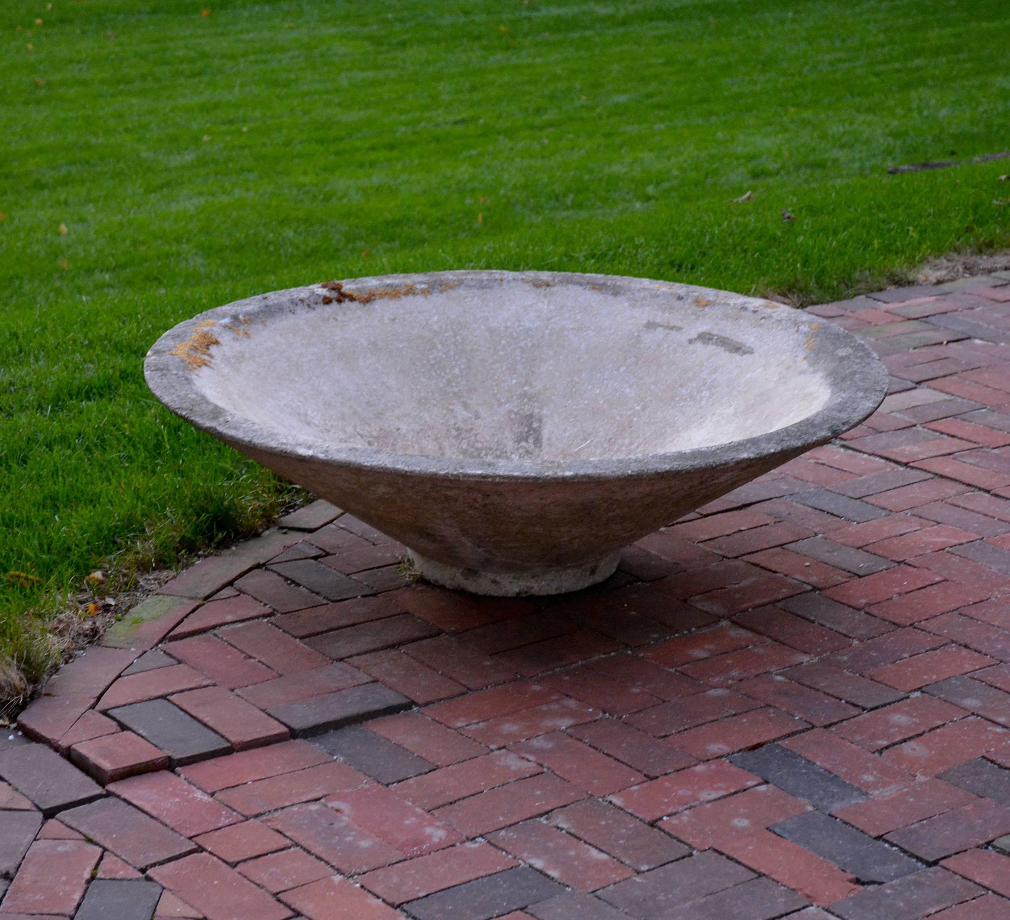 A Mid-Century Modern low wide planter or fountain bowl in composition stone.