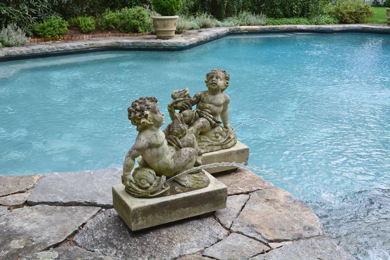 Neoclassical Pair of Carved Cherub Fountains