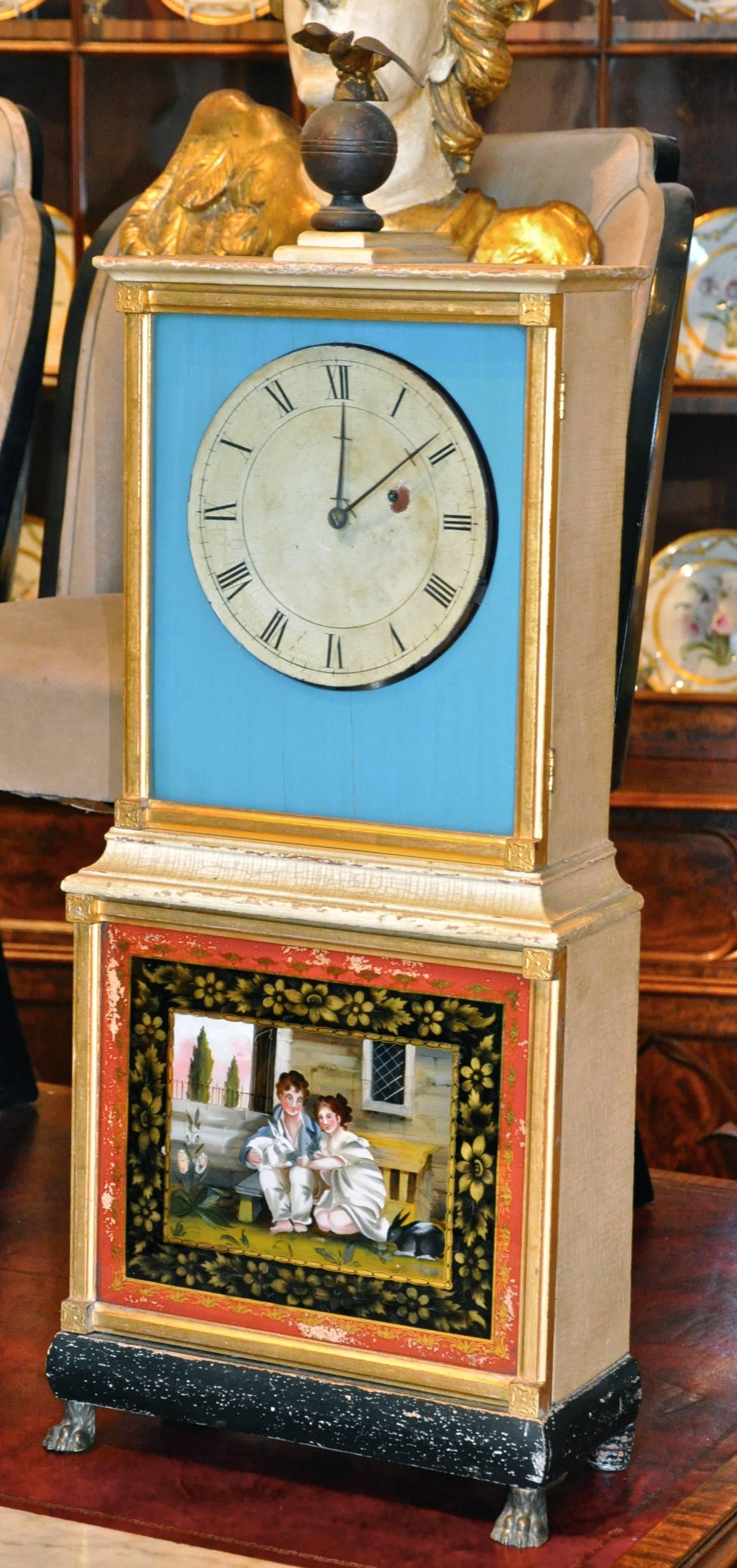 Rare Aaron Willard Federal églomisé bride's clock.

The attractive shelf clocks of this form were popularized at the turn of the 19th century in coastal Massachusetts and are subsequently referred to as “Massachusetts shelf clocks”. This highly