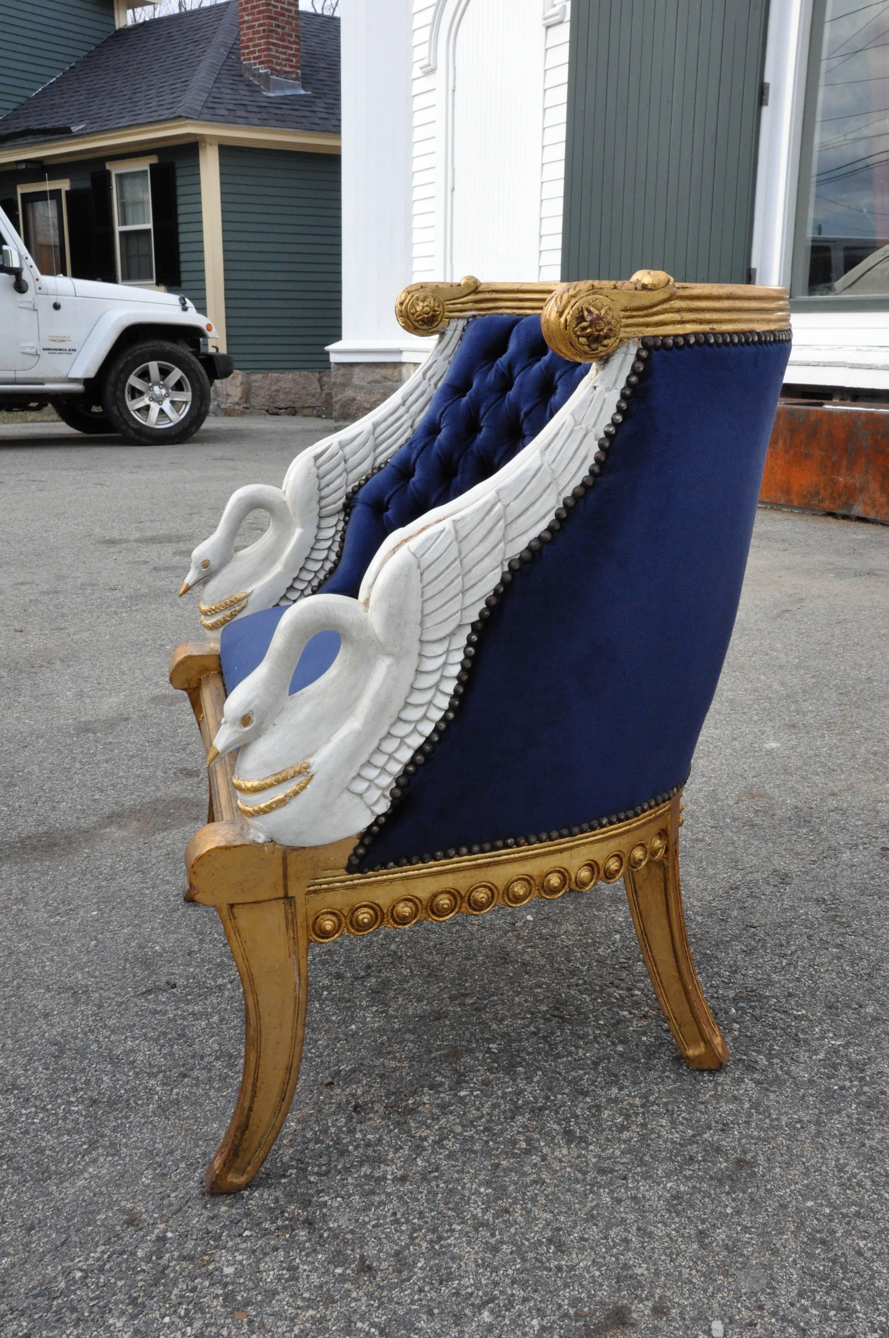 Pair of well carved and executed swan tub chairs in Empire style after Jacob.

Carved white painted swan supporting ample chair.
Solid and well built.