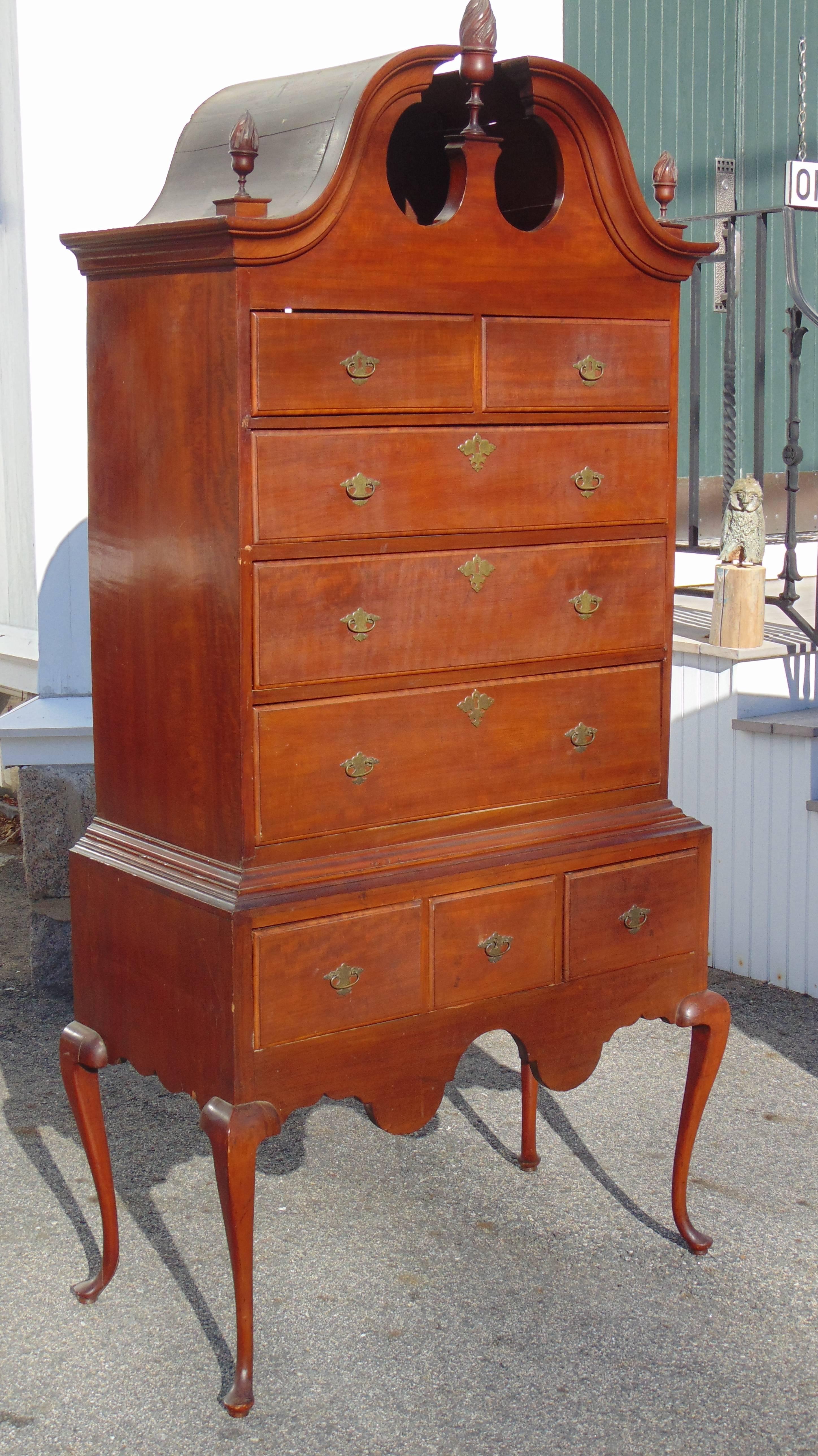 Period American cherry and mixedwood bonnet top highboy.

Queen Anne.
Charming Provincial Form.
New England.
Early Finish.