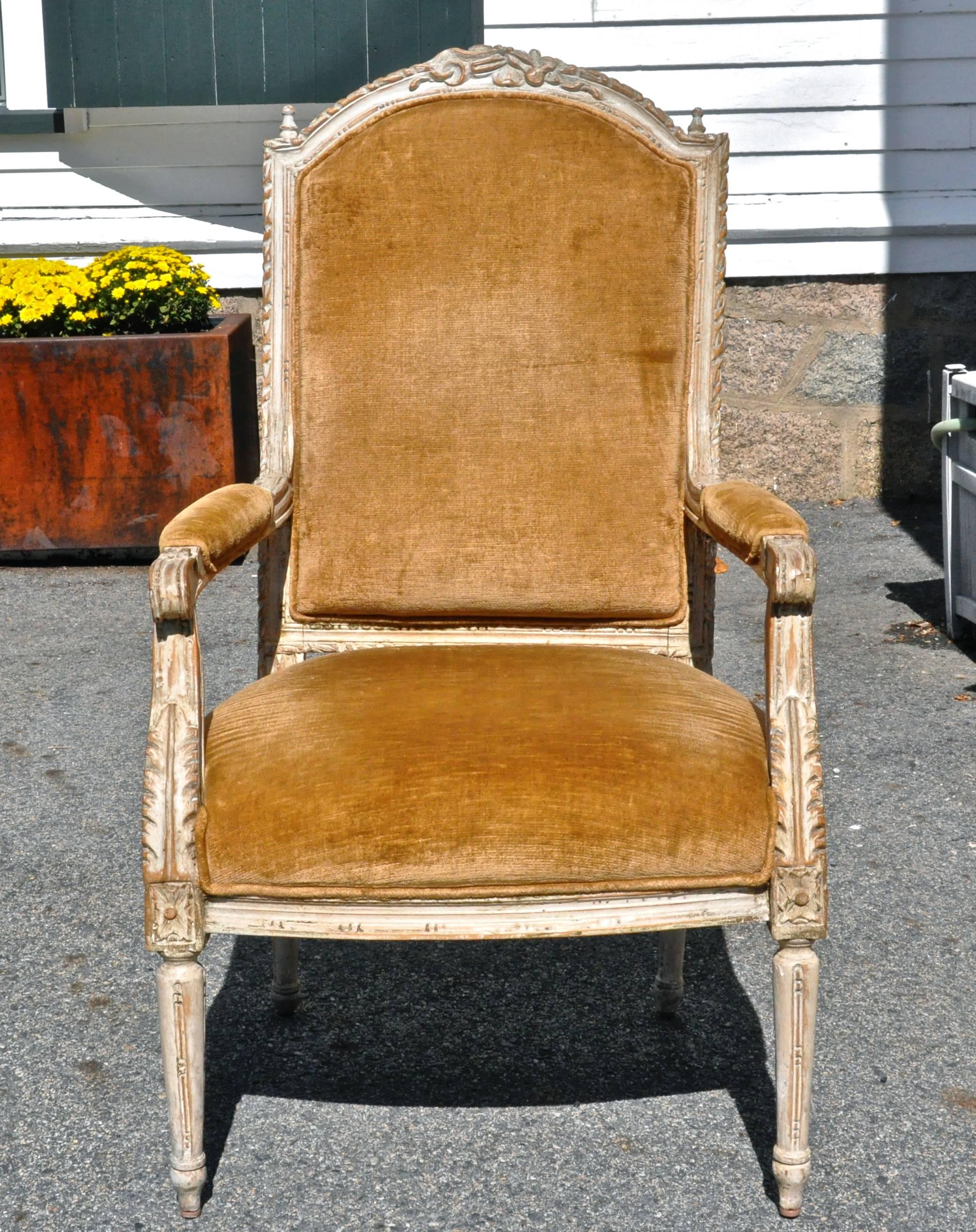 Two pairs of Italian painted and carved neoclassical armchairs.

Larger proportion.
Carved with stylized musical instruments to crest.
Paint original and beautifully worn.
Now is very usable golden brown mohair.

I will sell in pairs or all