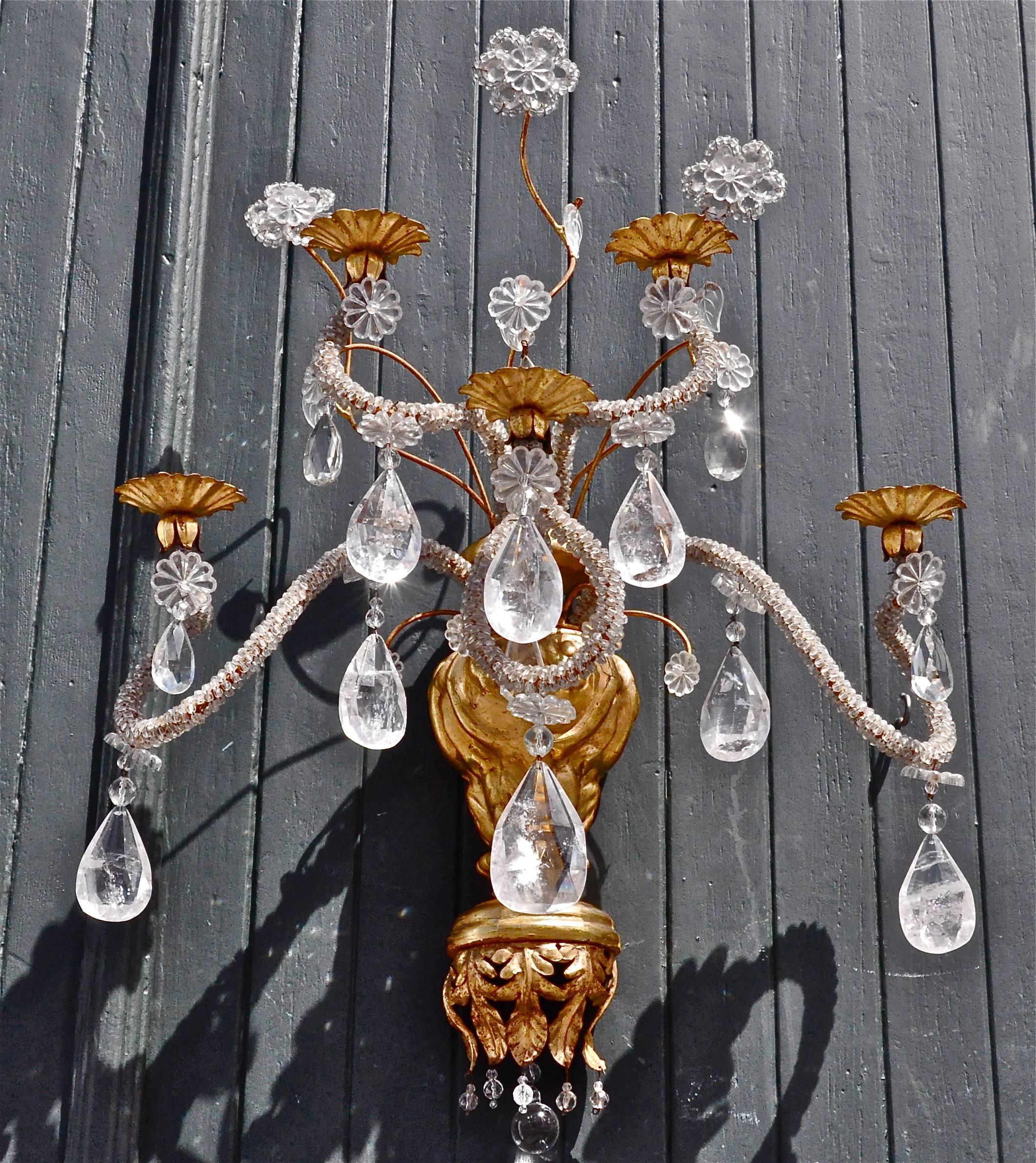 Pair of giltwood and Iron Italian rock crystal sconces.

All original gilding.
Carved wood and iron.
Stylistically similar to 