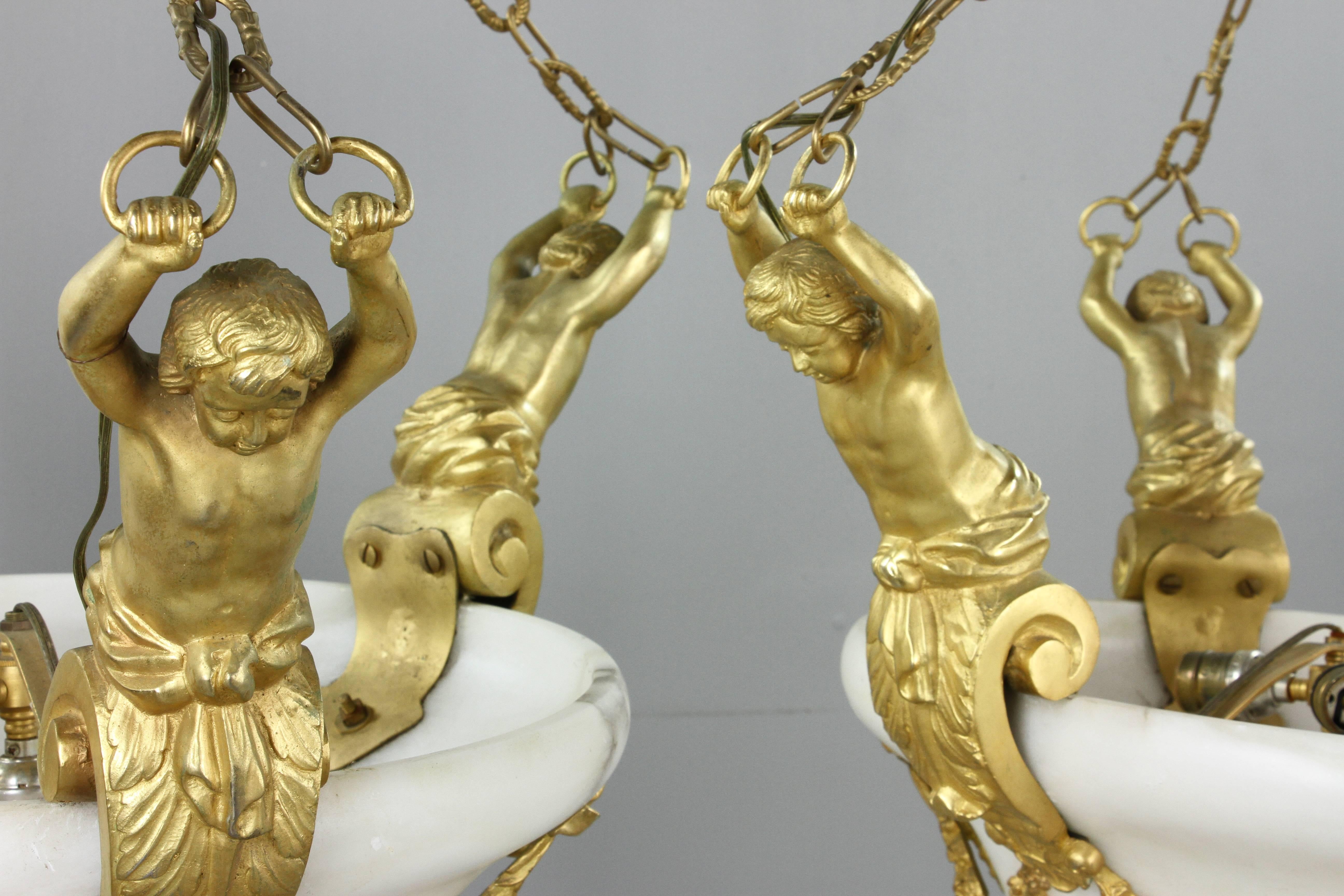 Carved Pair of 19th Century French Gilt Bronze and Marble Louis XVI Chandeliers
