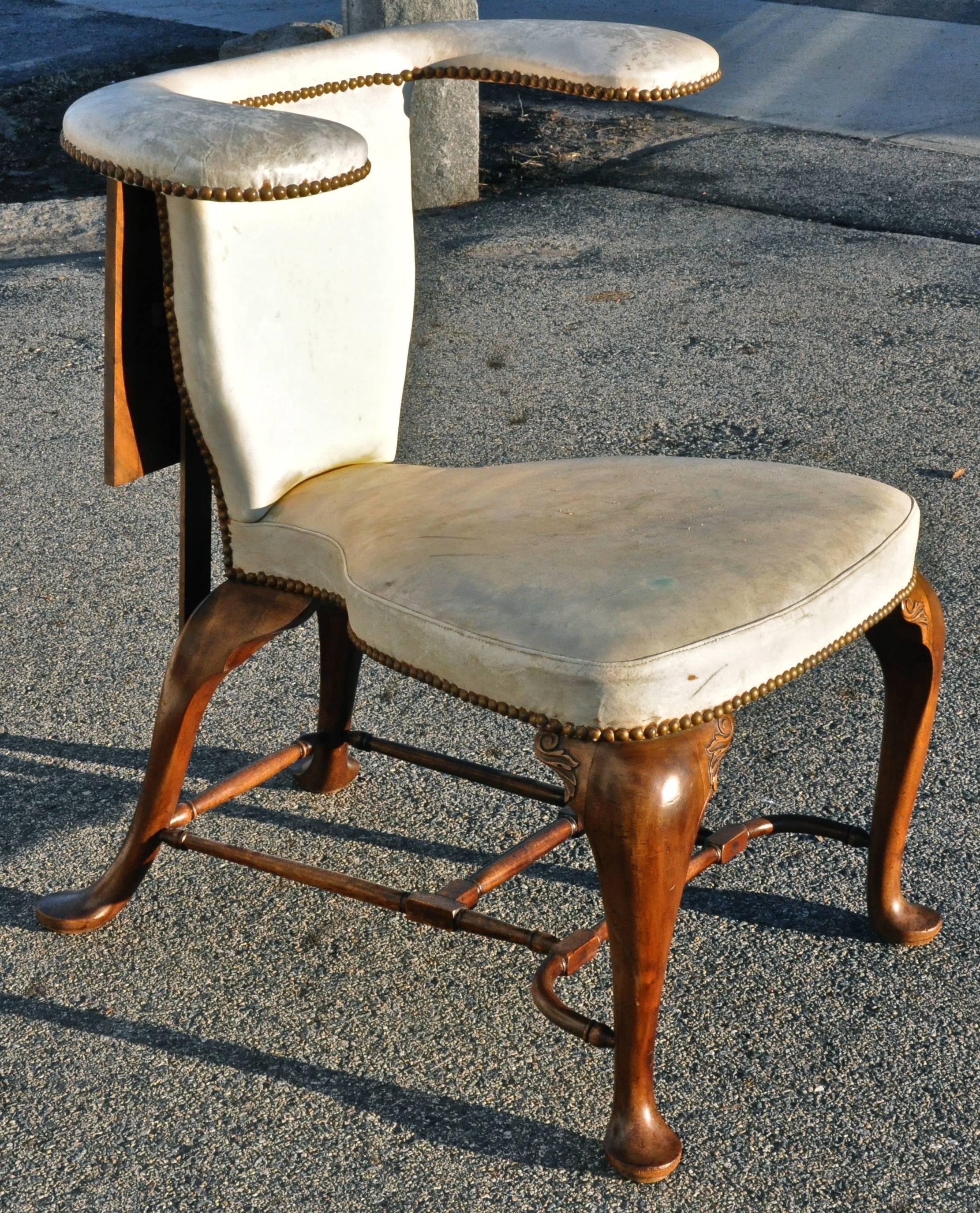 Georgian style Cockfighting Chair with adjustable reading or gaming surface.

Similar to an example in the Victoria and Albert Museum, this 
