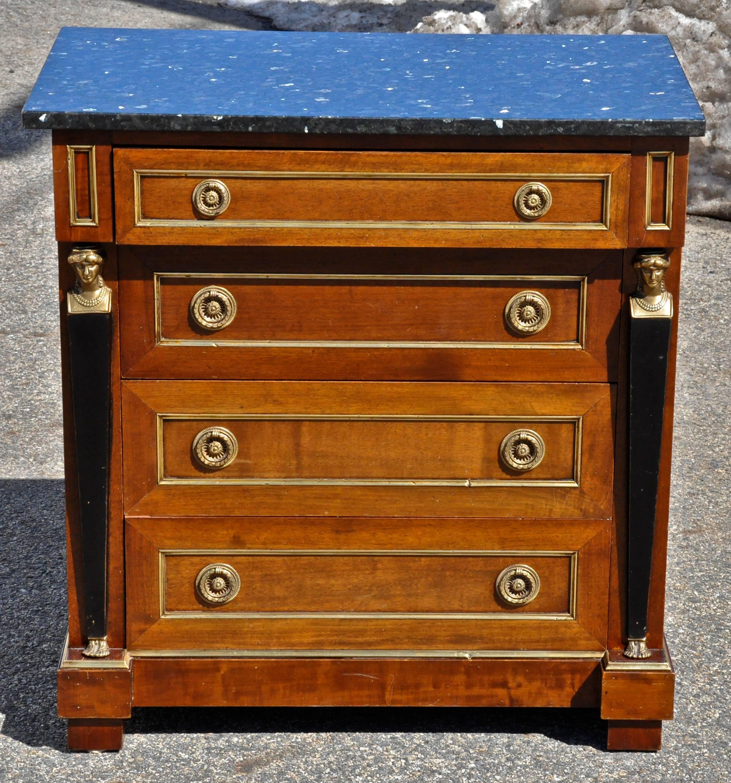 Pair of French Empire or Regency chest of drawers or commodes

Four brass trimmed drawers, neoclassical brass and ebonized caryatids flanking on each side, beautiful matching black granite tops




 