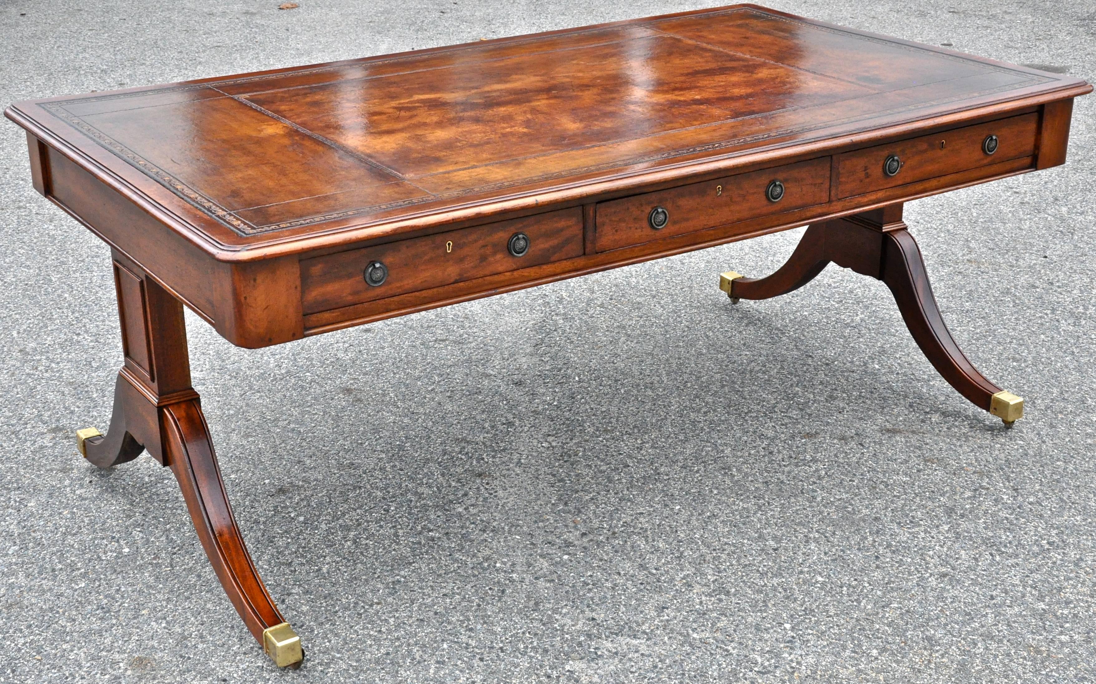 Pedestal Regency mahogany partner's desk, 19th century

Good leather top partner's desk. Drawers on both sides, finished on all sides, great size and clearance. Original tooled and embossed leather top.
       