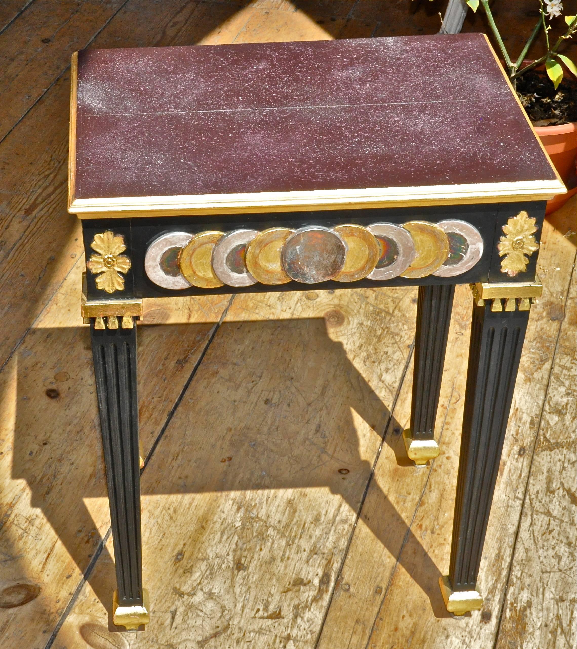 Wonderful pair of side tables

Designer created, artist painted
Neoclassical
Faux porphyry tops.