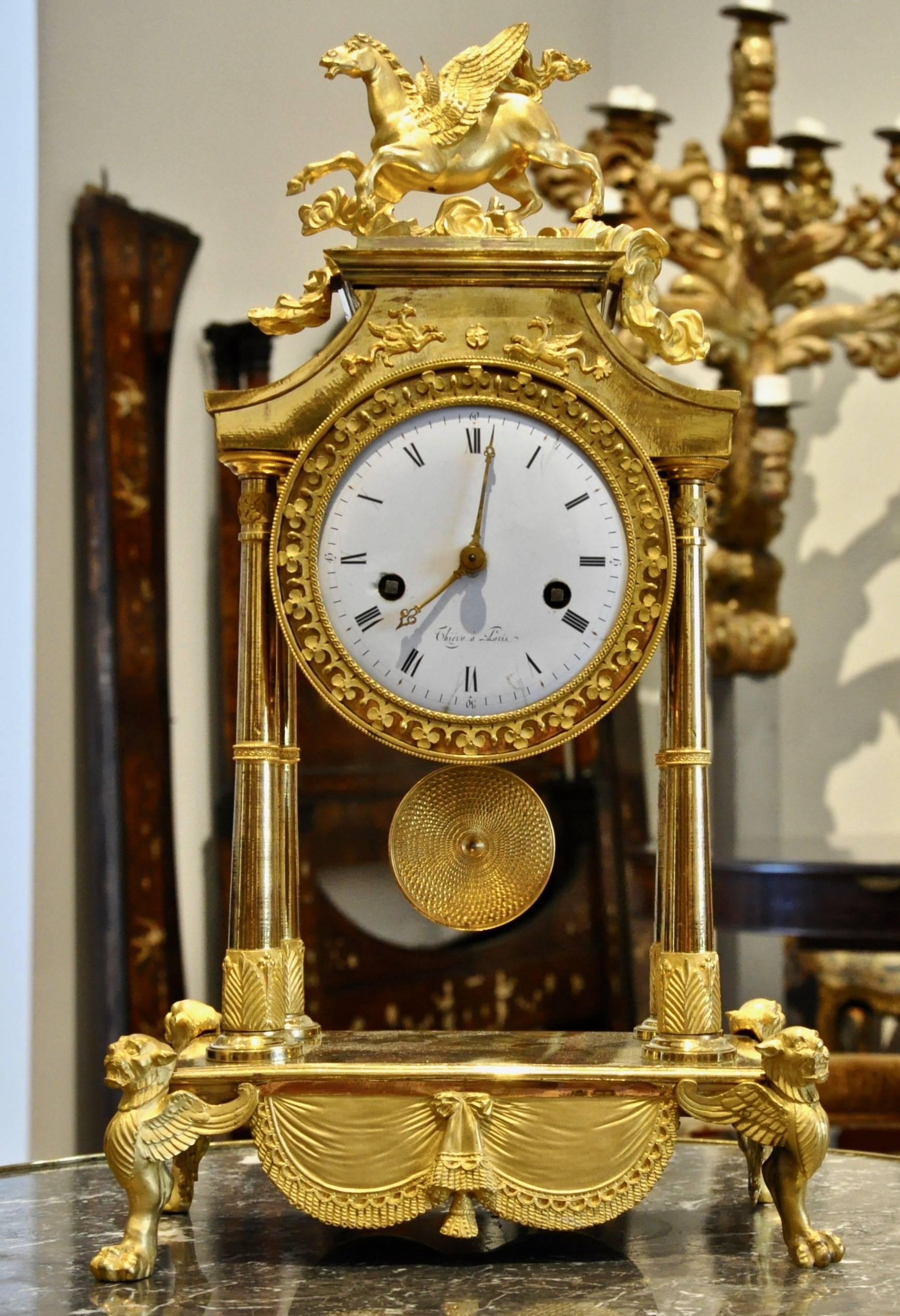Period French ormolu Director clock with rare Pegasus motif

Neoclassical late 18th century form. Egyptian form columns, Pegasus in clouds, form Monopod Griffin or lion supports
Original works. Gilding in amazing condition

signed 