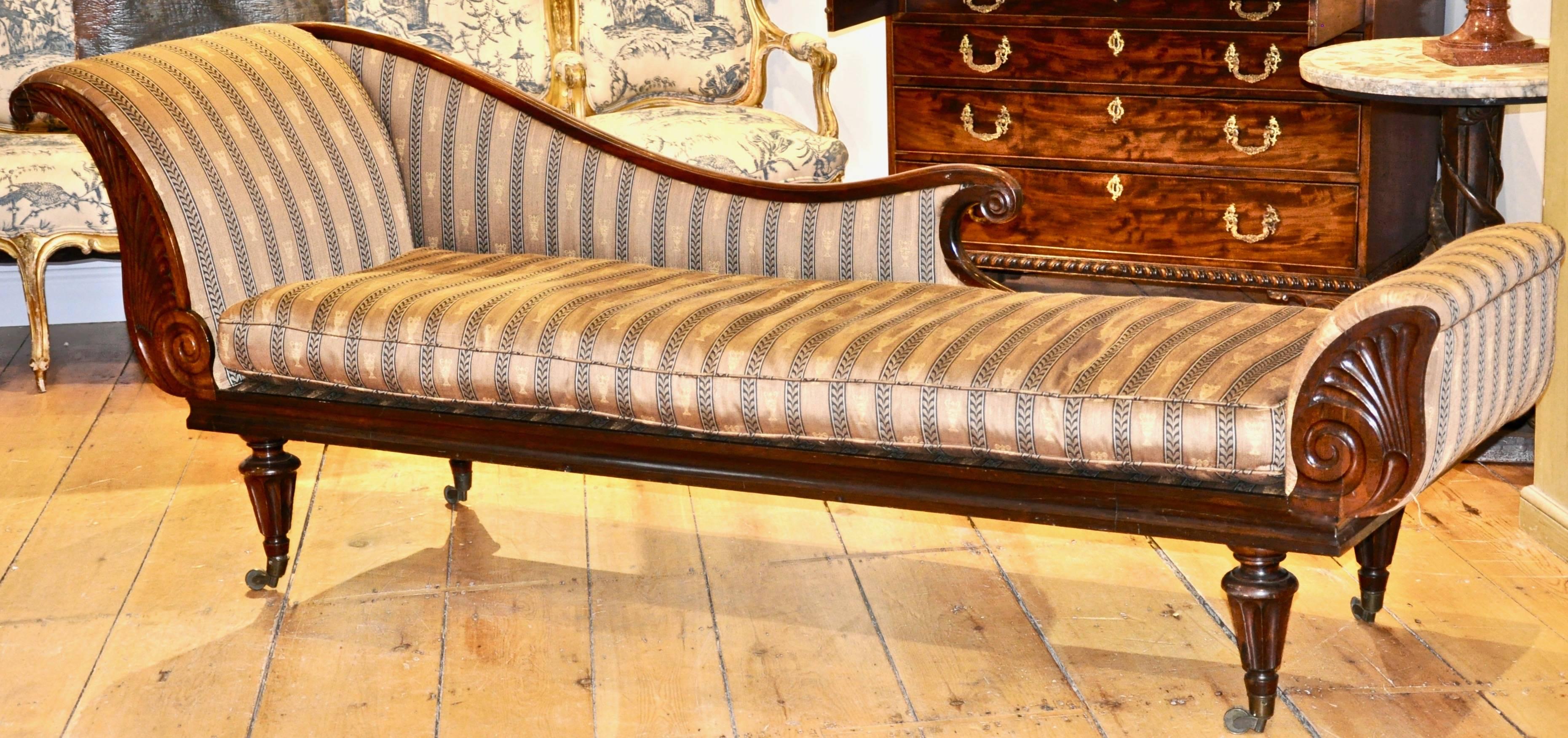 Period English Regency Rosewood Recamier in Manner of Marsh and Tatham

Neoclassical Form with wonderful modern length. Egyptian Revival Palmette at foot and Scrolled backrest
Four fluted legs
Now in period revival Regency fabric in usable