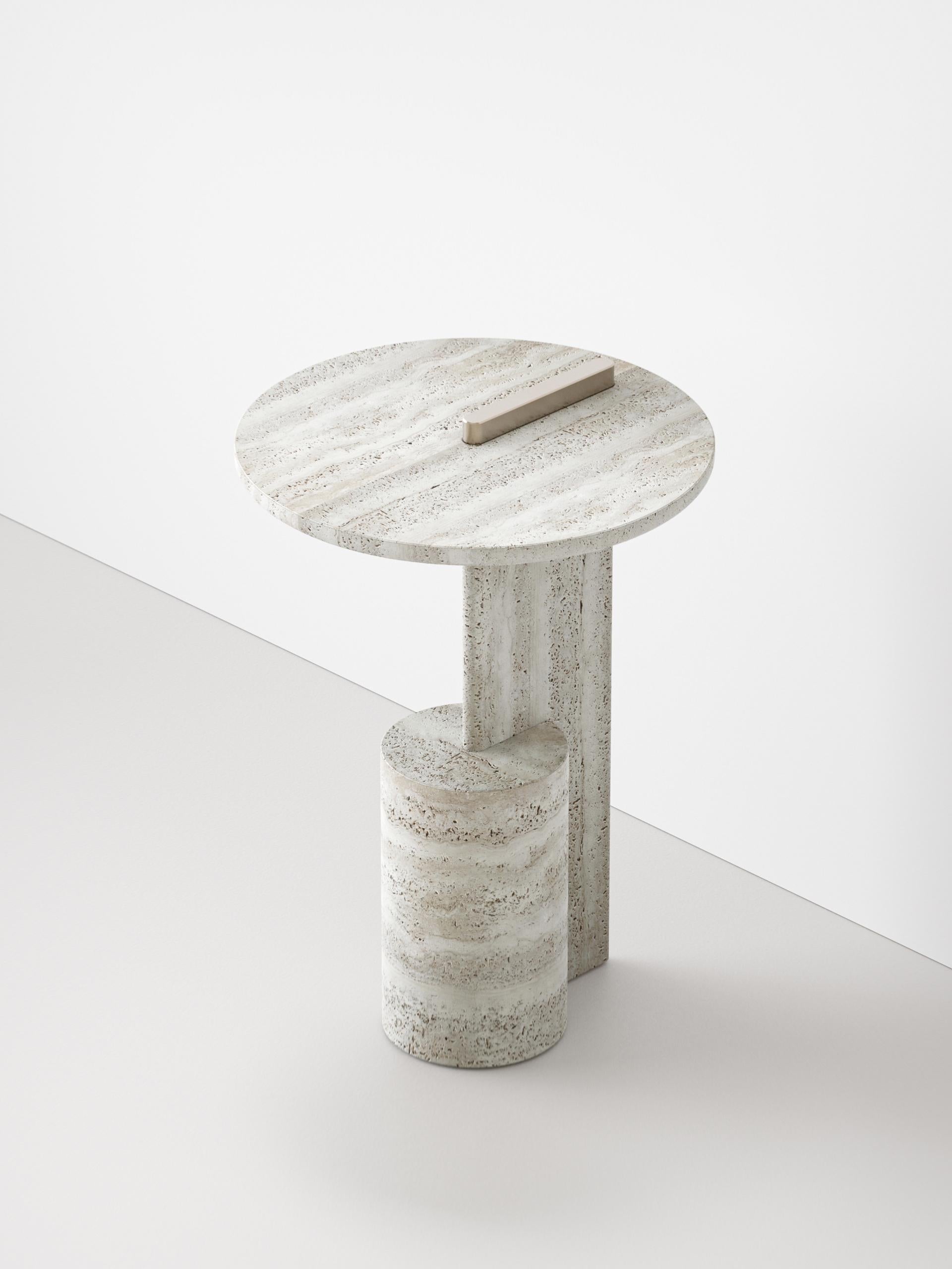 Primitive forms give life to a side table that makes clean, essential lines its main feature. The interpenetration of forms generates a simple, yet extremely functional product for those who use On as a support in their daily moments of