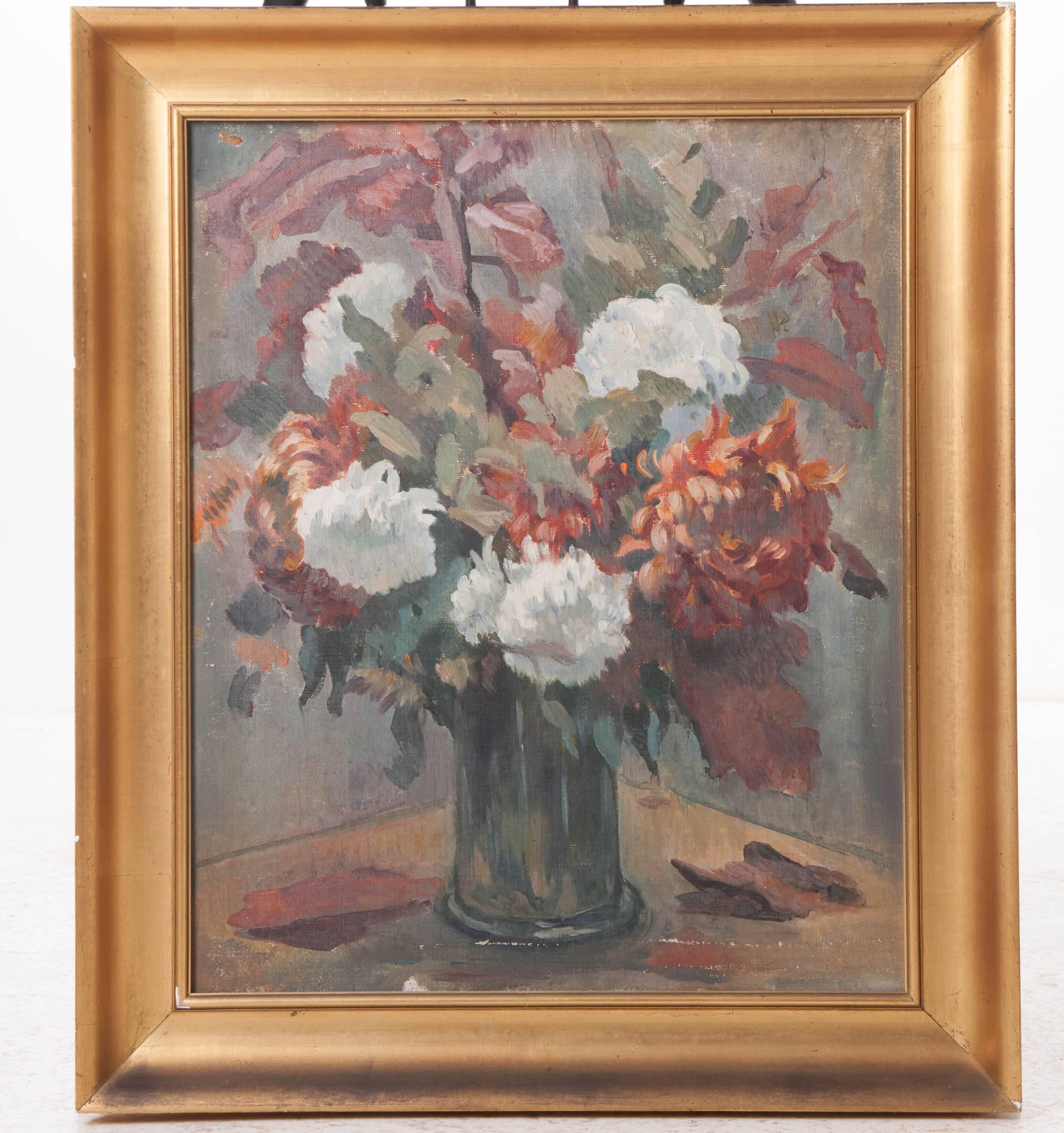Oil on canvas. Heavily textured, paint-laden brush strokes create depth and definition among the petals of each flower depicted in this beautiful French still life. The warmer colors found in the painting are accentuated in the warm gold gilt frame.