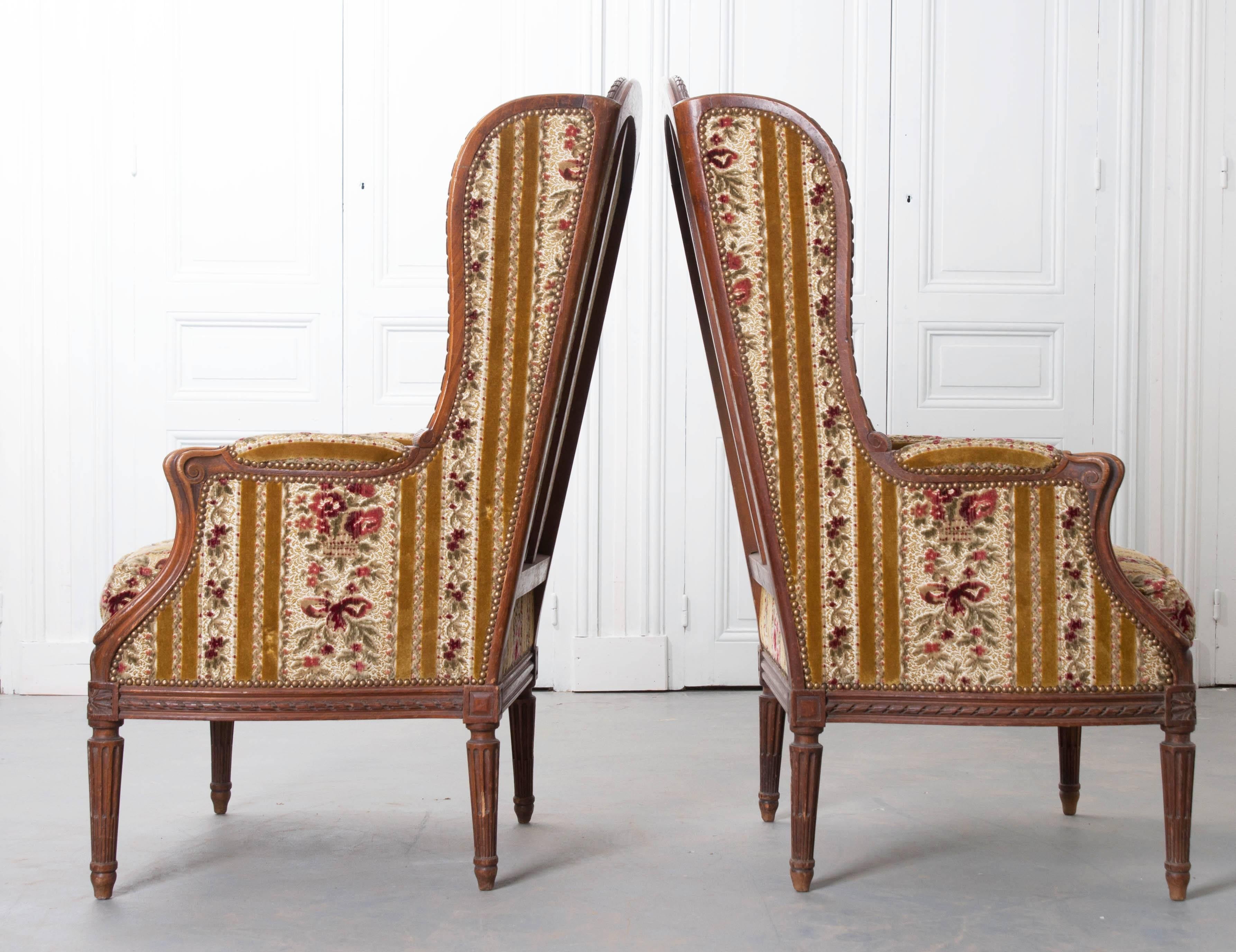 Pair of French 19th Century Walnut Transitional Wingback Bergères 3