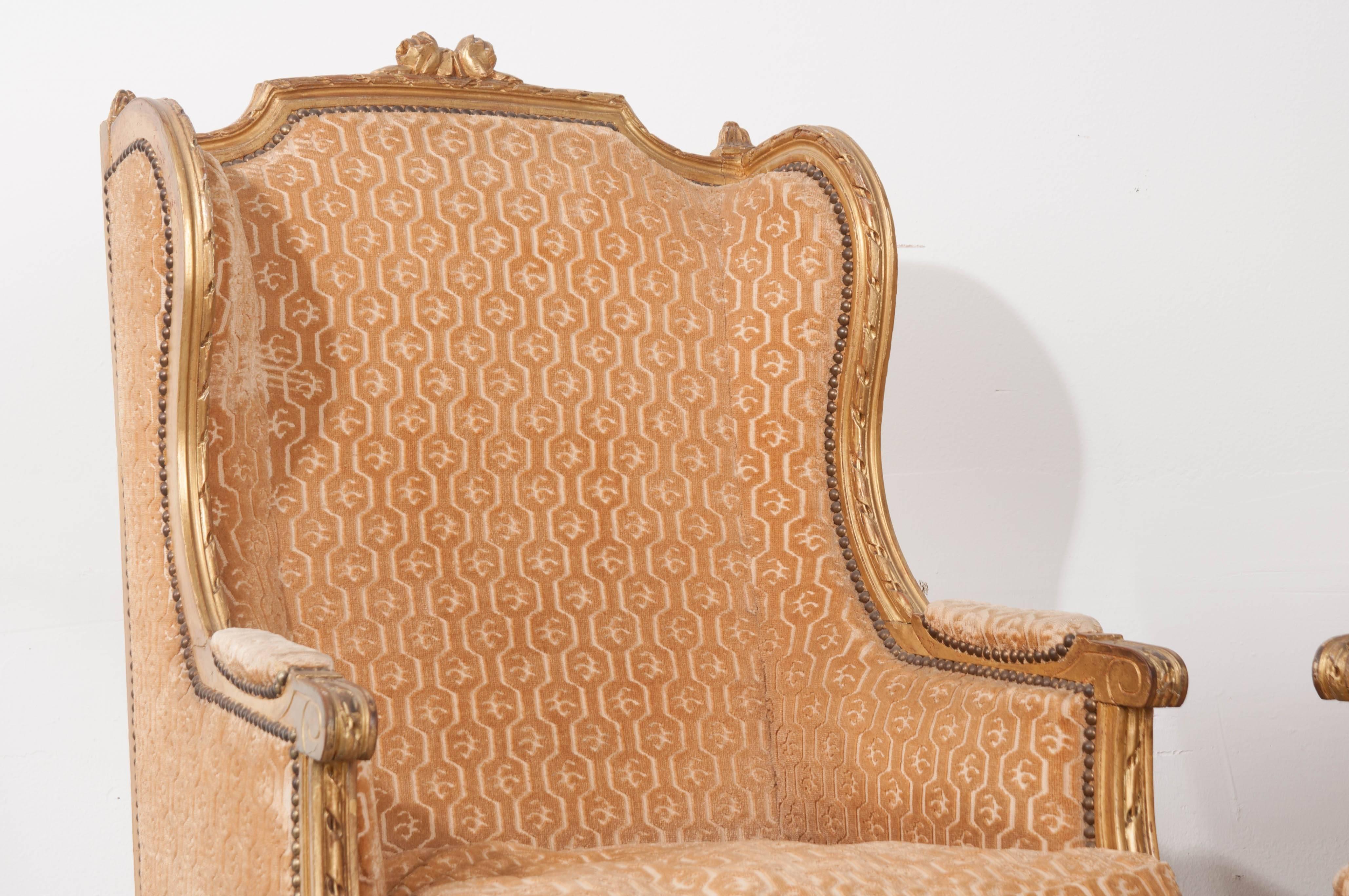 Pair of French 19th Century Louis XVI Gold Gilt Wingback Bergères In Good Condition In Baton Rouge, LA