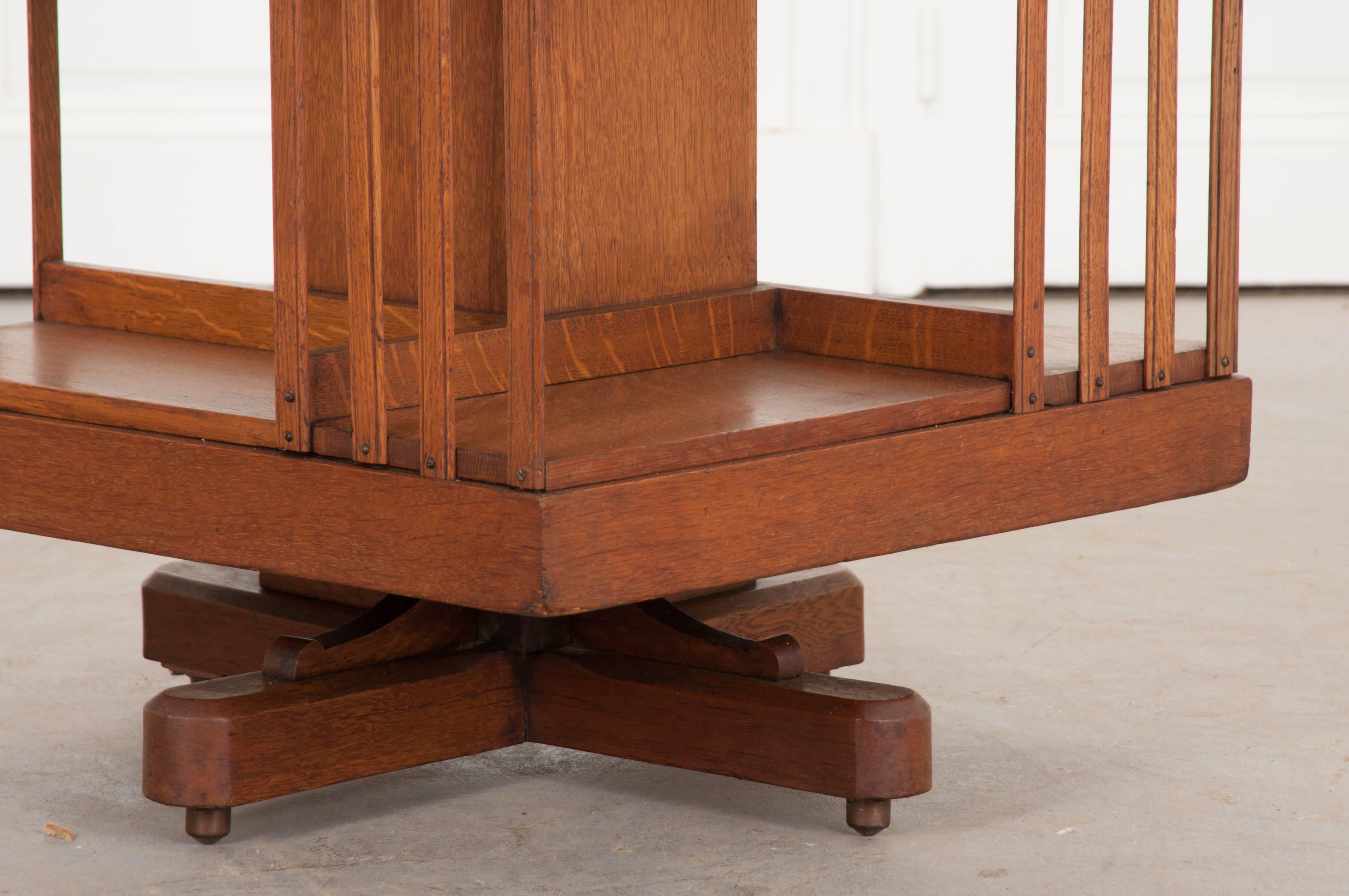 Patinated English 19th Century Oak Revolving Bookcase by S & H Jewell