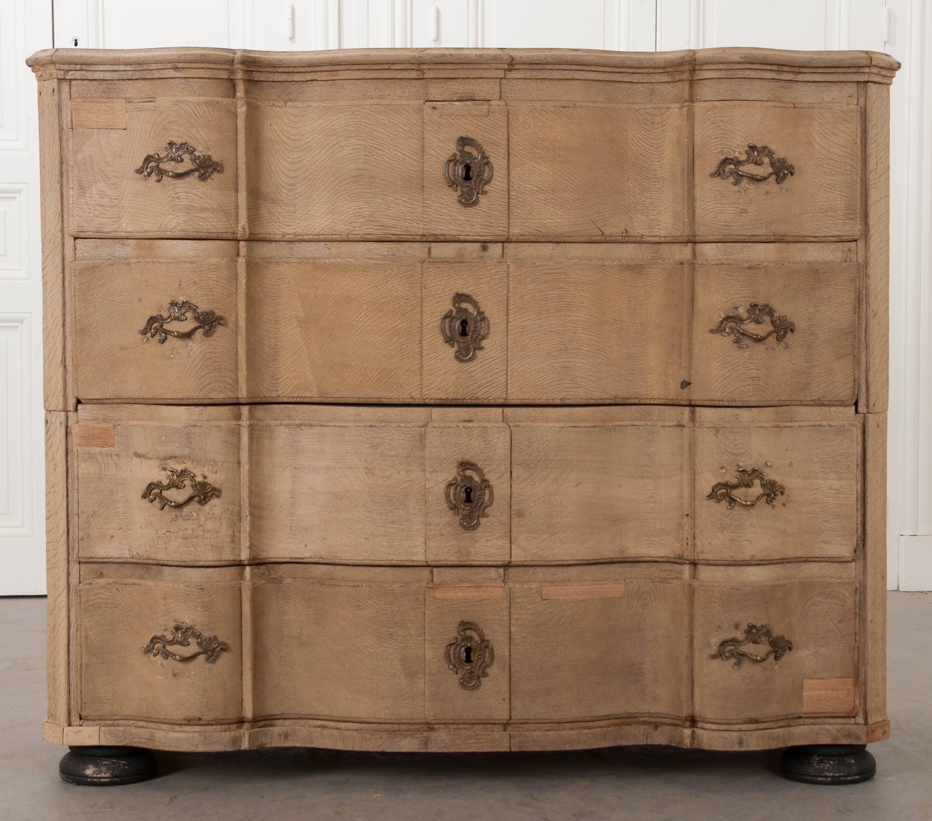 A stunning 19th century Swedish chest-on-chest commode. The oak used to construct the commode has an outstanding bleached finish. The chest separates into two bodies. This makes moving the piece easier, and at the time was a necessity, as 19th