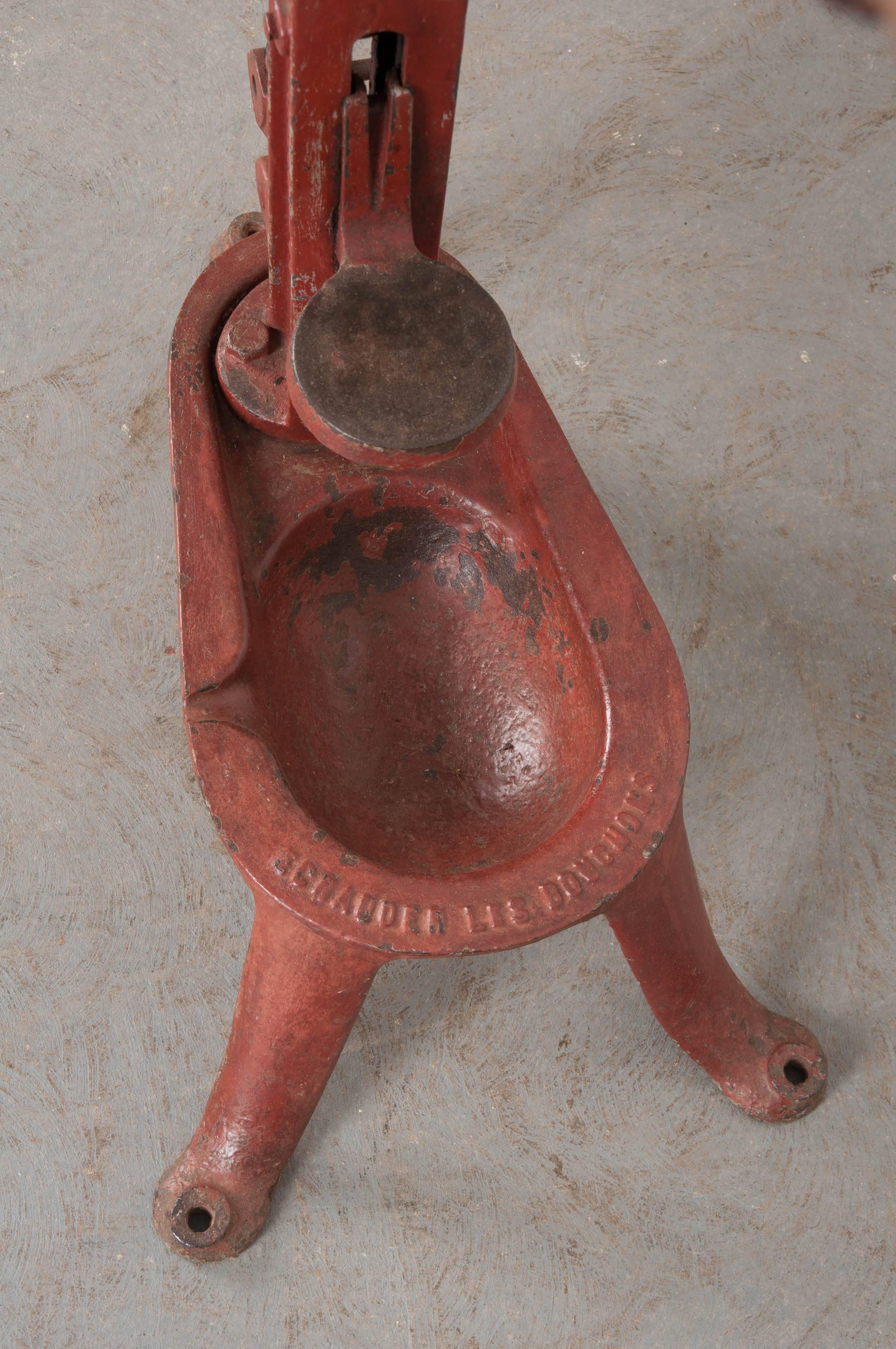 Cast French 19th Century Red Painted Wine Corker
