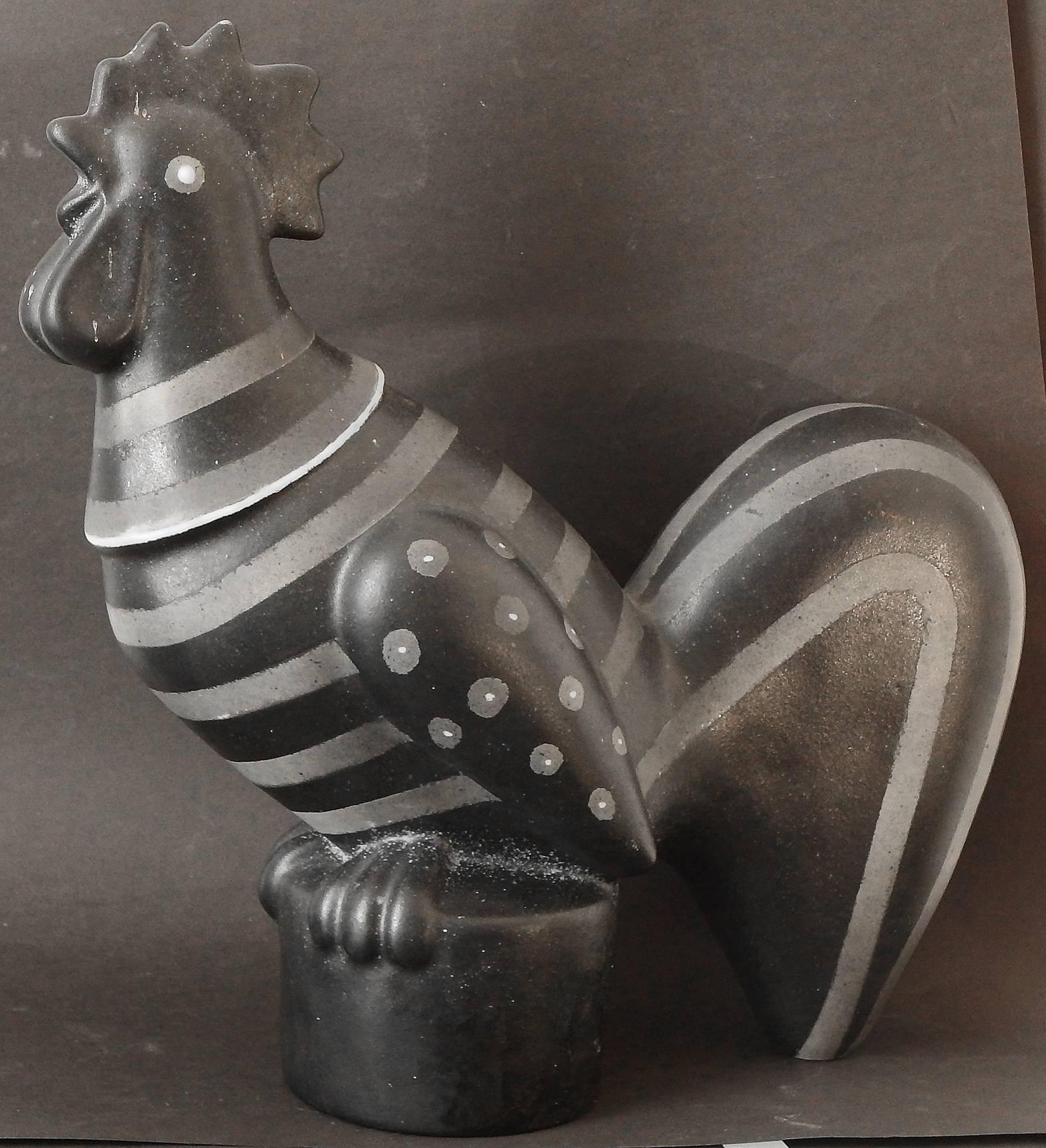 Striking and bold, this rare and large ceramic sculpture by Waylande Gregory depicts a rooster with striped body and dotted wings, in tones of black and charcoal with touches of white. Gregory was a renowned WPA sculptor and innovative ceramicist,