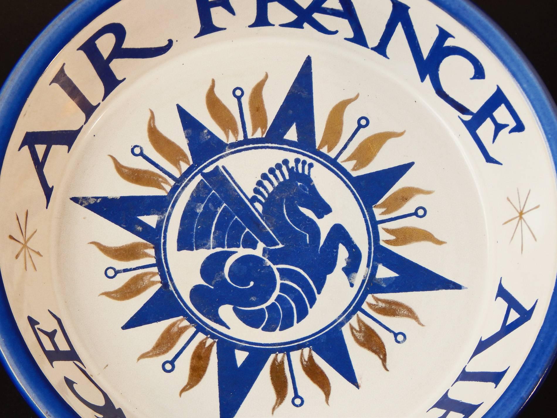 This rare and striking bowl was created for Air France in the 1940s by Marcel Noverraz, who formed a highly-regarded pottery in Carouge, located in the French-speaking sector of Switzerland. When Air France was formed via the merger of several