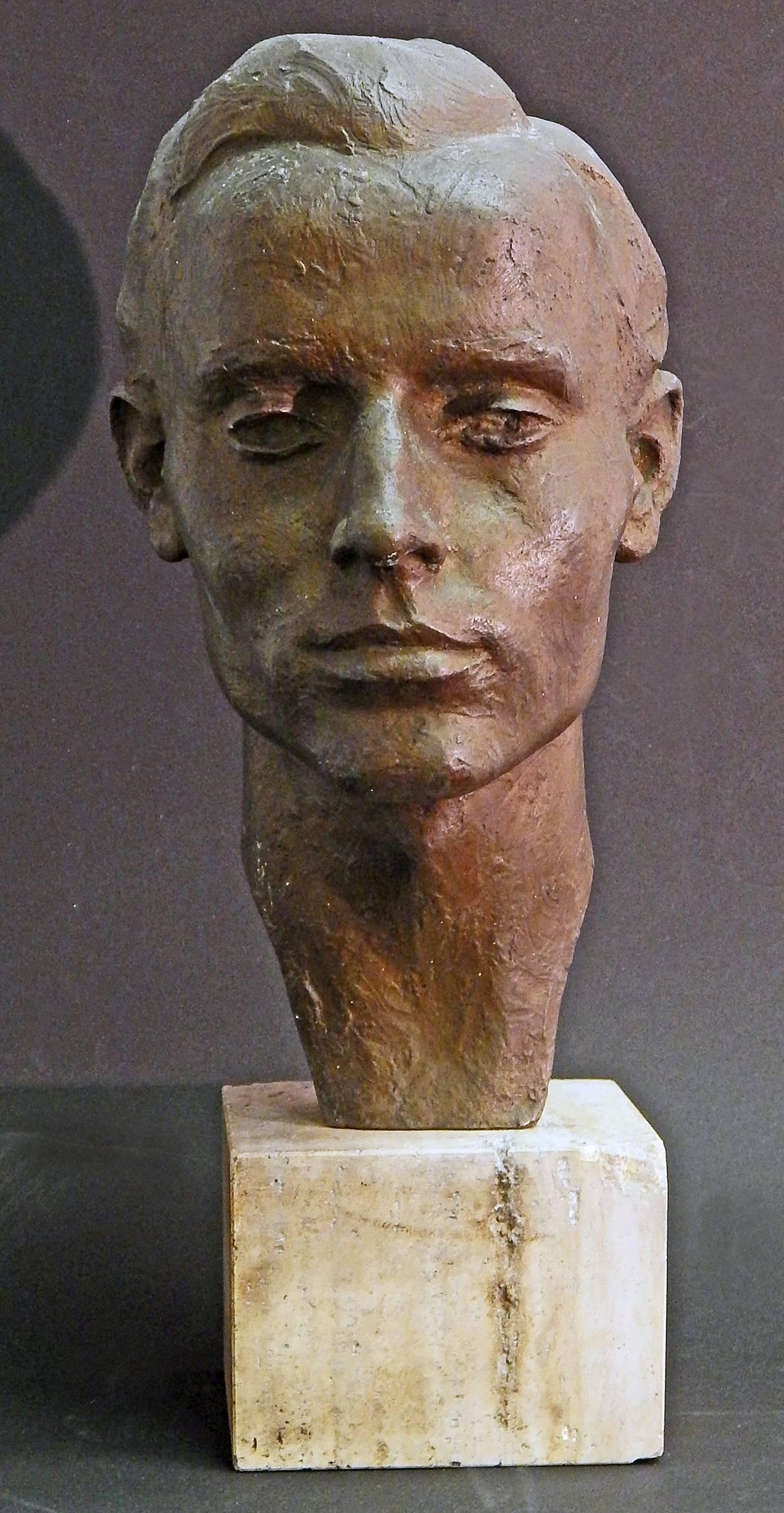 Sculpted by August Bischoff and cast by the famous Brandis foundry in Dusseldorf, Germany, which also cast bronzes by important artists such as Arno Breker, this unique bronze sculpture depicts a handsome young man with strong, well-defined