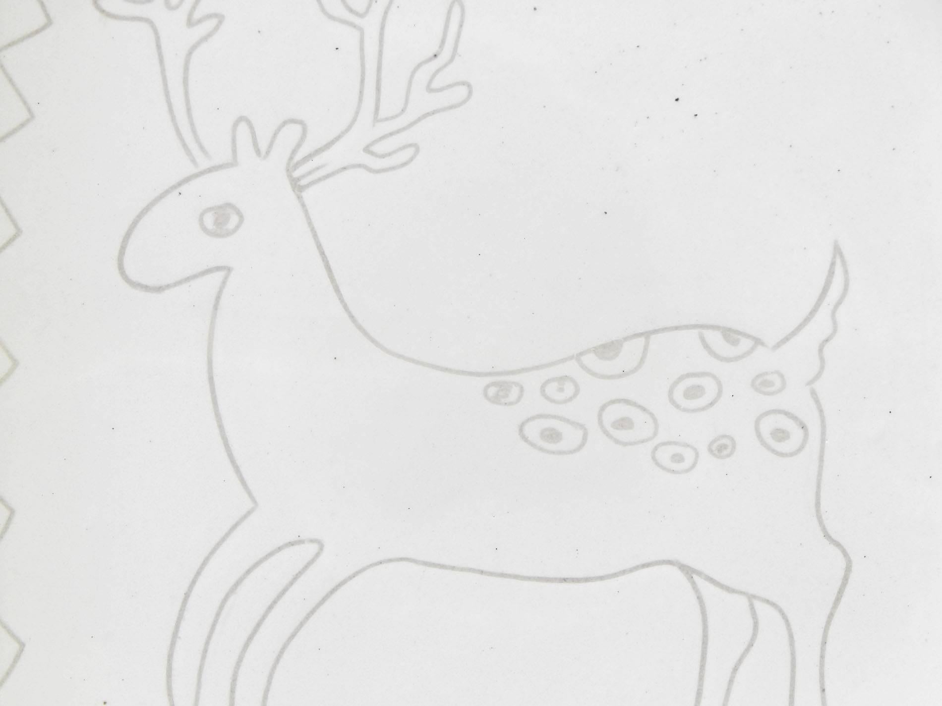 A rare and delightful example of the famous Glidden Pottery's early work and just in time for Christmas, this square dish depicts a prancing reindeer in a soft off-white glaze. A sgraffito technique was used by Glidden Parker, founder of the