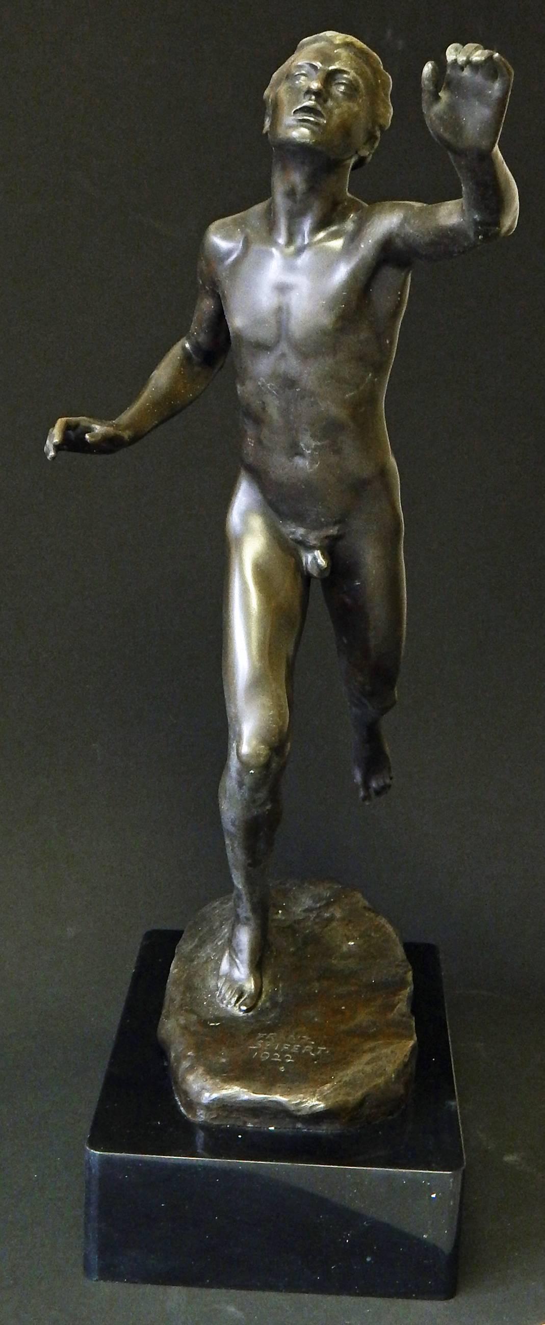 Sculpted as European artists were moving from Beaux Arts realism to a more stylized modern approach to the figure, which we now call Art Deco, this large and rare bronze depicts a nude male runner in full stride. Here there is none of the drapery