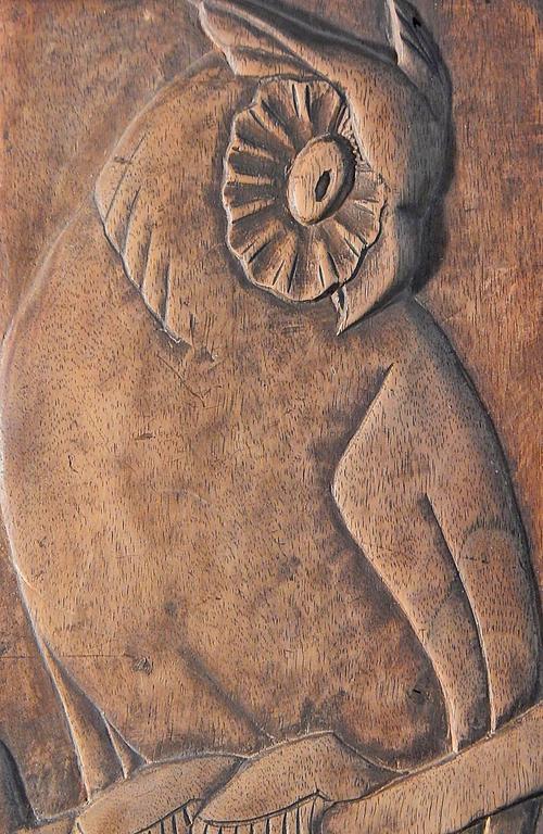 Beautifully conceived and carved, this evocative and dignified bas relief sculptural panel of an Eagle Owl, looking downward toward his next prey, perhaps, was carved by Don Griffith, a WPA artist in Colorado. Dated 1933, the panel was carved out of