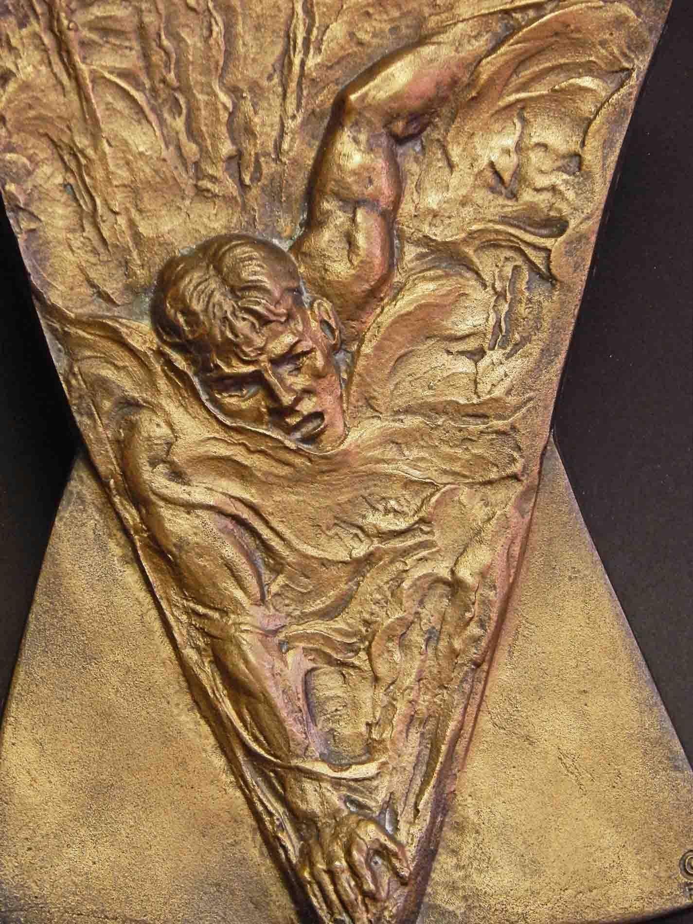 Clearly sculpted and cast as the prototype for a bronze awards plaque celebrating accomplishment in the freestyle or front crawl stroke, this piece shows the athlete at the peak of power, his body causing the surrounding water to froth and foam