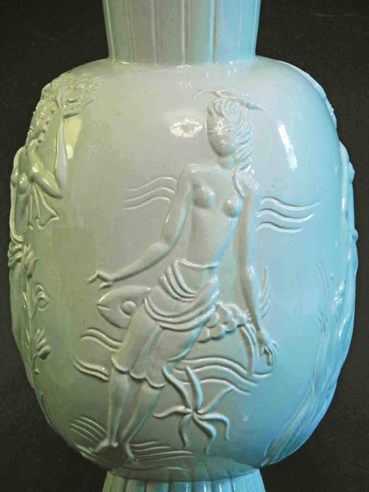 Perhaps Vally Wieselthier's greatest masterpiece after emigrating From Vienna to New York in the early 1930s, this unique vase depicts -- in dramatic bas relief -- the Four Elements: Earth, Water, Fire and Air. Each of the Elements is depicted as a
