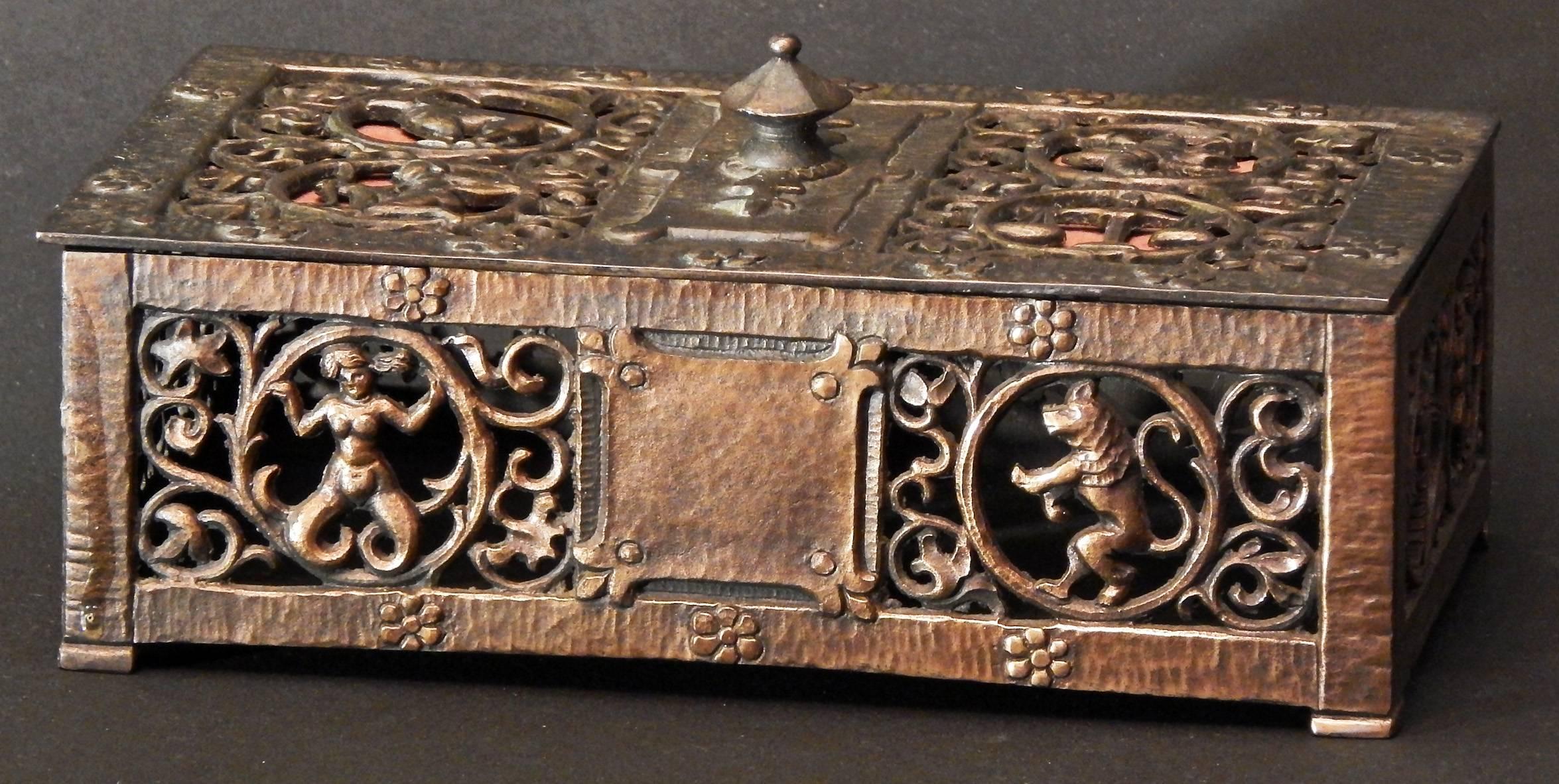 Beautifully cast and finished with a lovely, lustrous patina, this bronze lidded box depicts all 12 of the Zodiac symbols -- four on the lid and two on each of the four sides. The box was created by Oscar Bach, one of America's leading makers of