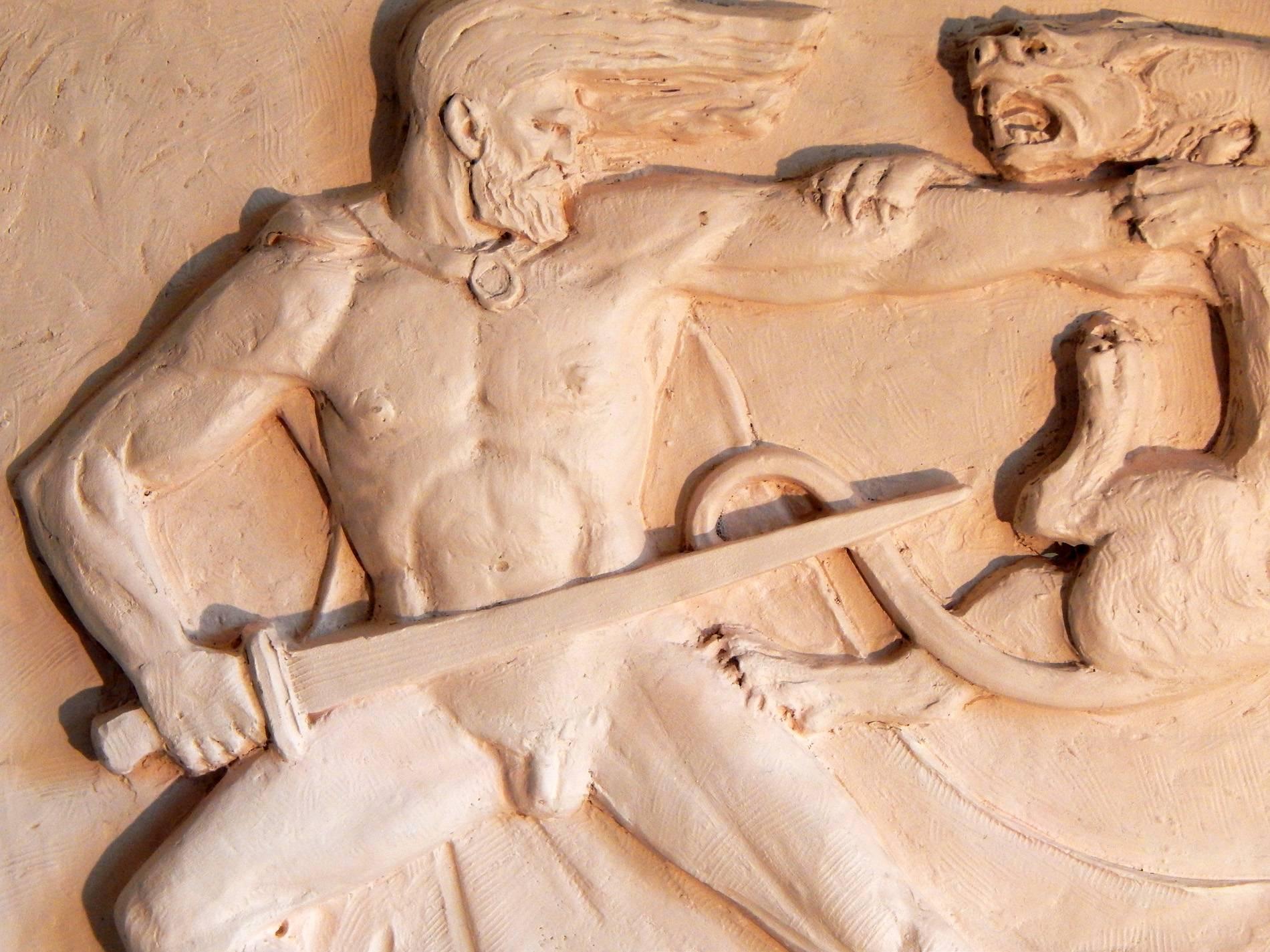 This unique panel, depicting a nude Hercules figure with sword in hand, fending off the snarling Nemean lion, represents the first of his famous Twelve Labors. The strong, stylized figure of Hercules, and the bold relief of the panel are Classic Art