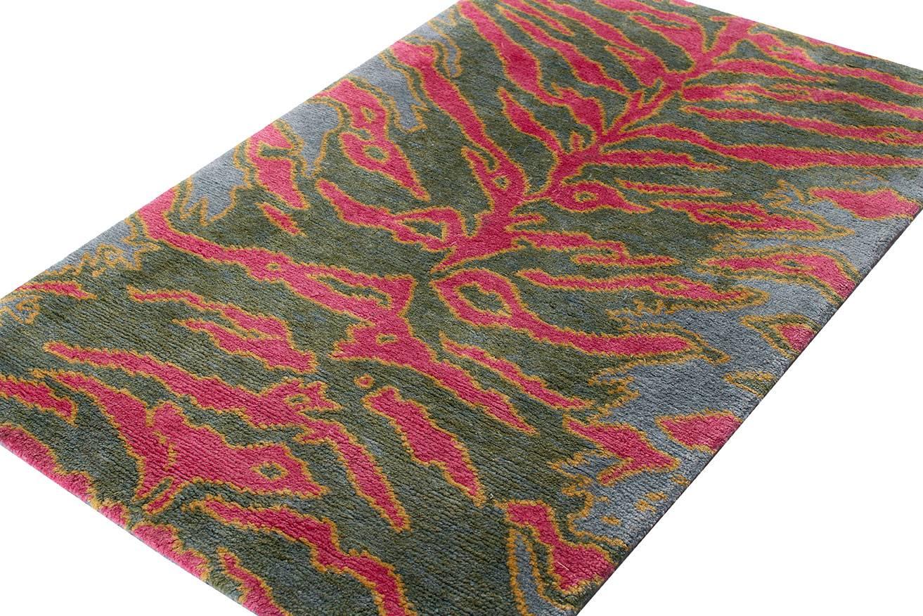 Tiger is a Joseph Carini signature carpet design that has been translated into countless color-ways. Our take on the traditional animal print gives it a fresh, unconventional appeal. This fine handmade carpet is silky soft to the touch and has a