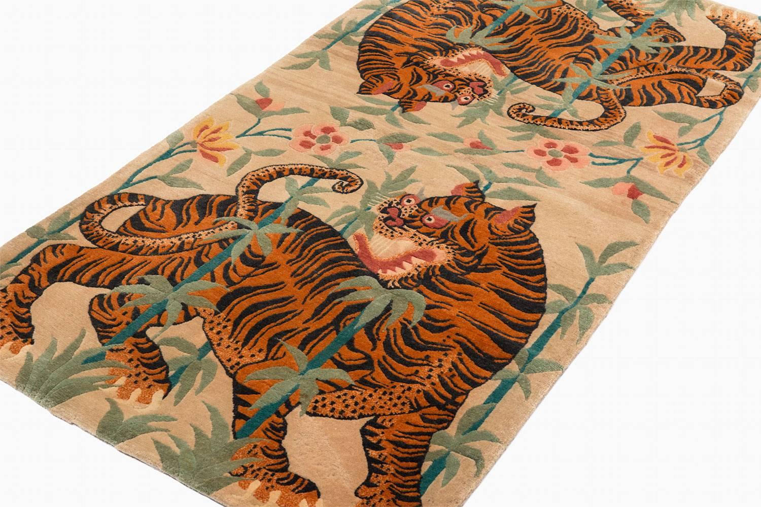 This Tibetan tiger rug was probably woven in the 1980s. The wool is silky and excellent quality. It is not possible to get this quality of wool today. The colors are fantastic. In great condition and ready to use.