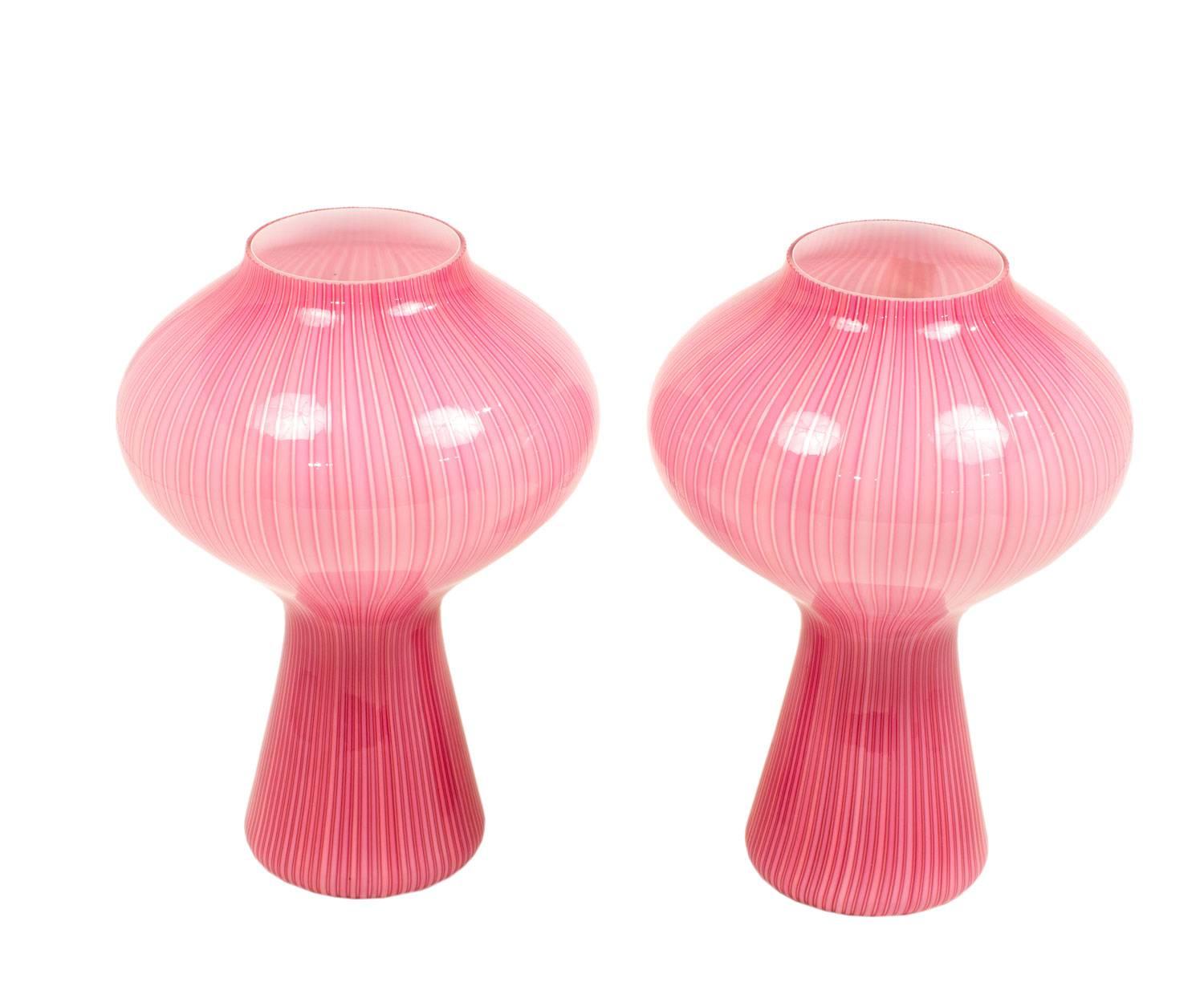 A pair of Venini candy colored pink and violet table lamps in beautiful original condition. These came from an old bungalow in L.A. 