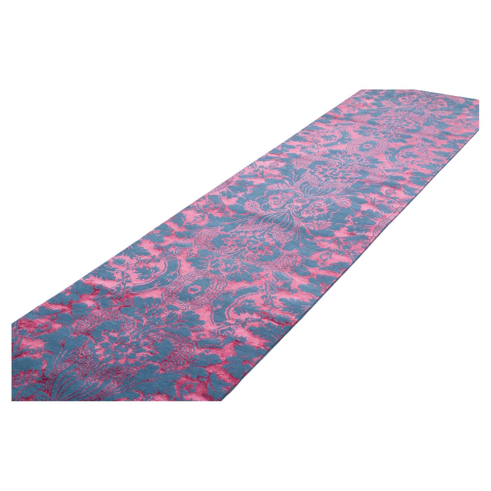 Penelope embodies a sophisticated floral and traditional pattern, both contemporary and timelessly classic. This hand knotted, silk and wool carpet, designed by Joseph Carini, shown in 3’ (W) x 12’ (L).  Our couture Penelope design is colored in a