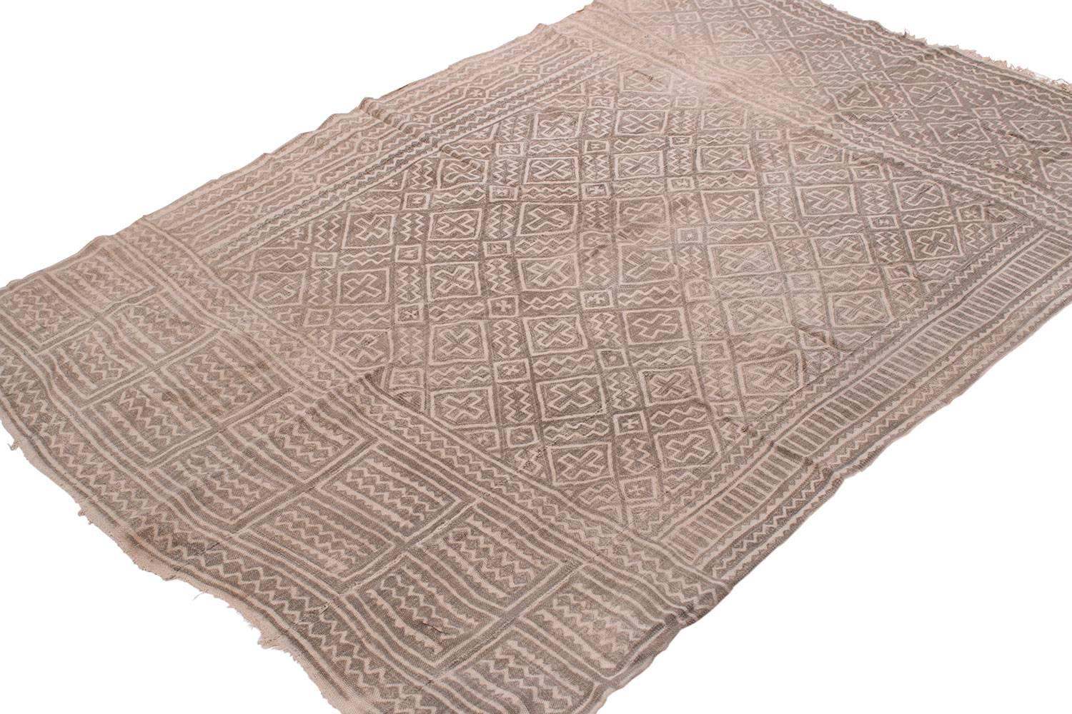 This mud cloth was made circa 1980s and was made from handwoven strips of cotton. This mud cloth comes from Mali and made by the Bamana tribe. The cotton is very soft. The pattern has intriguing subtle changes throughout that are not apparent at