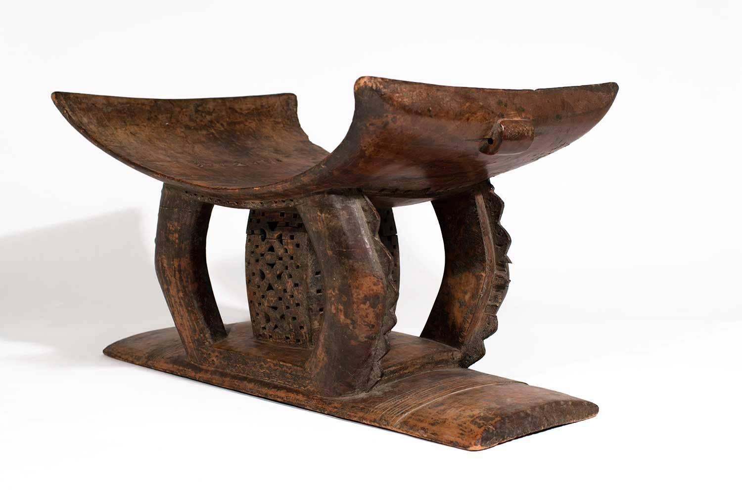 Stools indicate status, power and a succession of Ghanian chiefs and kings. Carved from single blocks, Asante (or Ashanti) stool's traditionally have crescent-shaped seats, flat bases, and complex support structures, which exist in many designs with