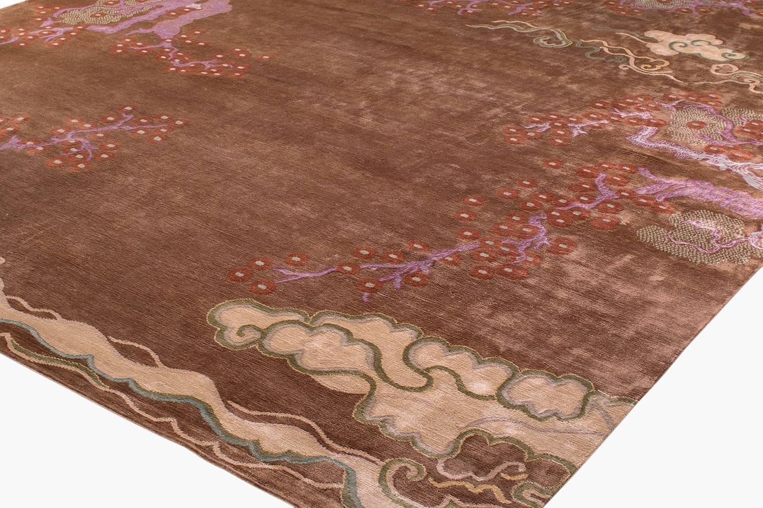 Tree and Cloud three is an ode to spring days and Classic Eastern motifs. On a bronze background, fragrant cherry blossoms of copper and violet bloom under whimsical floating clouds. Woven in luxurious silk. Designed by Joseph Carini.

Shown in