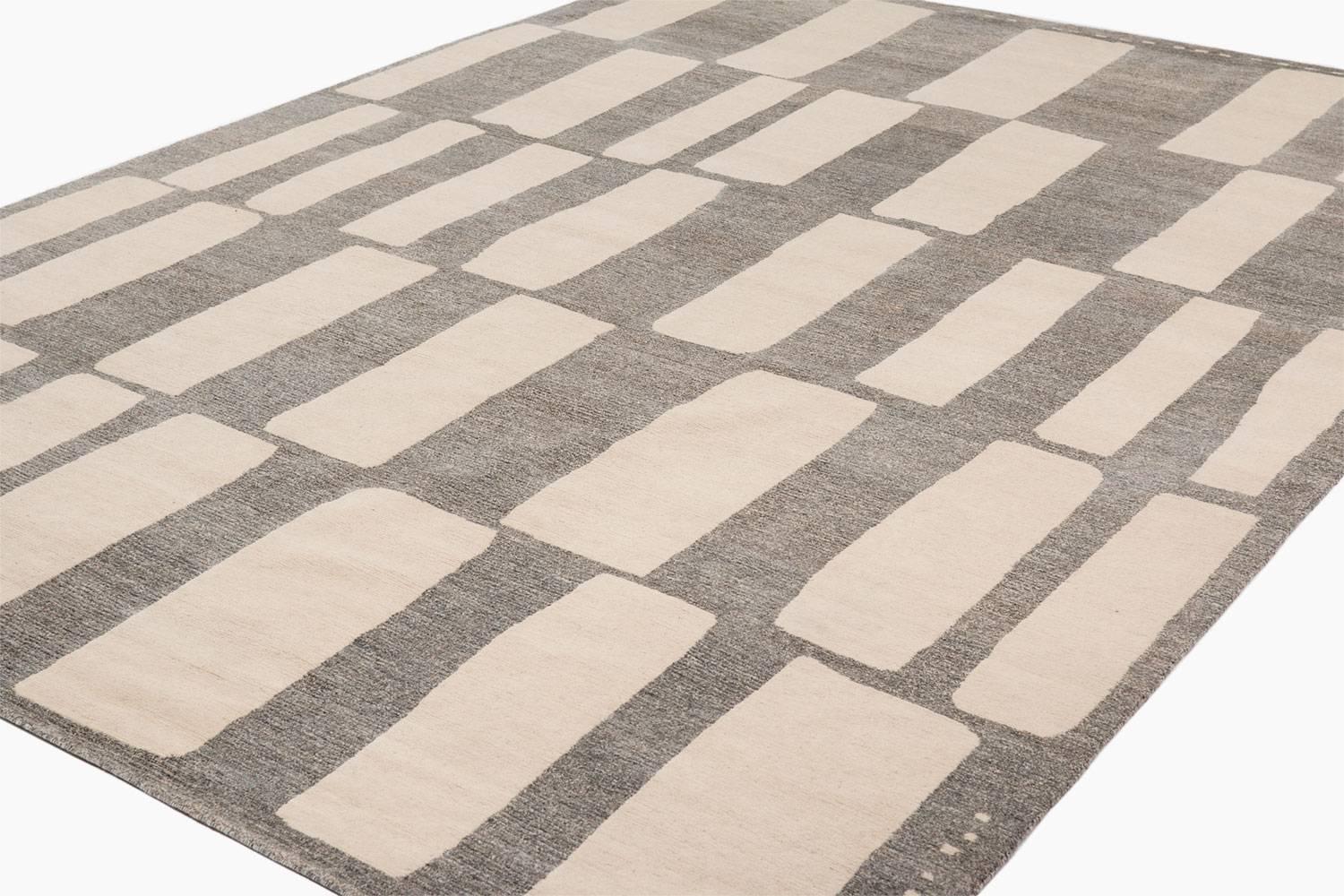 Modern Contemporary Grey and White Wool 'Coco Drum' Area Rug