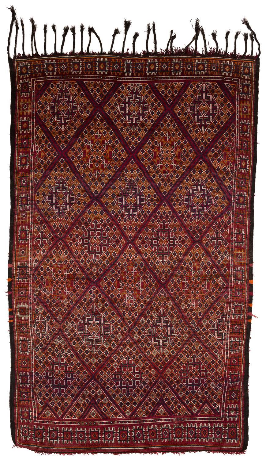 This vintage Moroccan rug is a classical type of Beni McGuild, but it's in mint condition, and it has a beautiful hidden design that is just barely visible from the front side of the rug! There's excellent abrash with lots of variation. This is