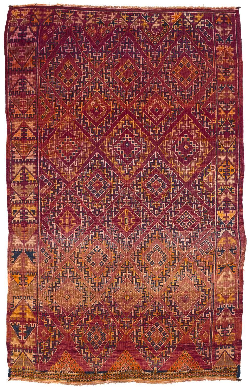 This Moroccan rug is in next to perfect condition, the finest and most elegant one from this origin. This rug is really stellar- color, design, and high quality Berber wool, it has it all!
