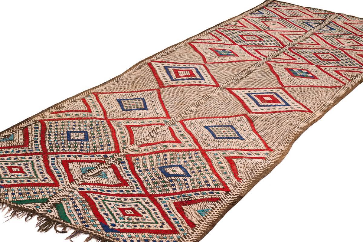 It is hard to describe why this Beni Mguild rug is so outstanding. You have to have seen thousands of technically perfect but uninspired and boring ones to really appreciate this one. It has a high degree of liberty that is very, very rare,