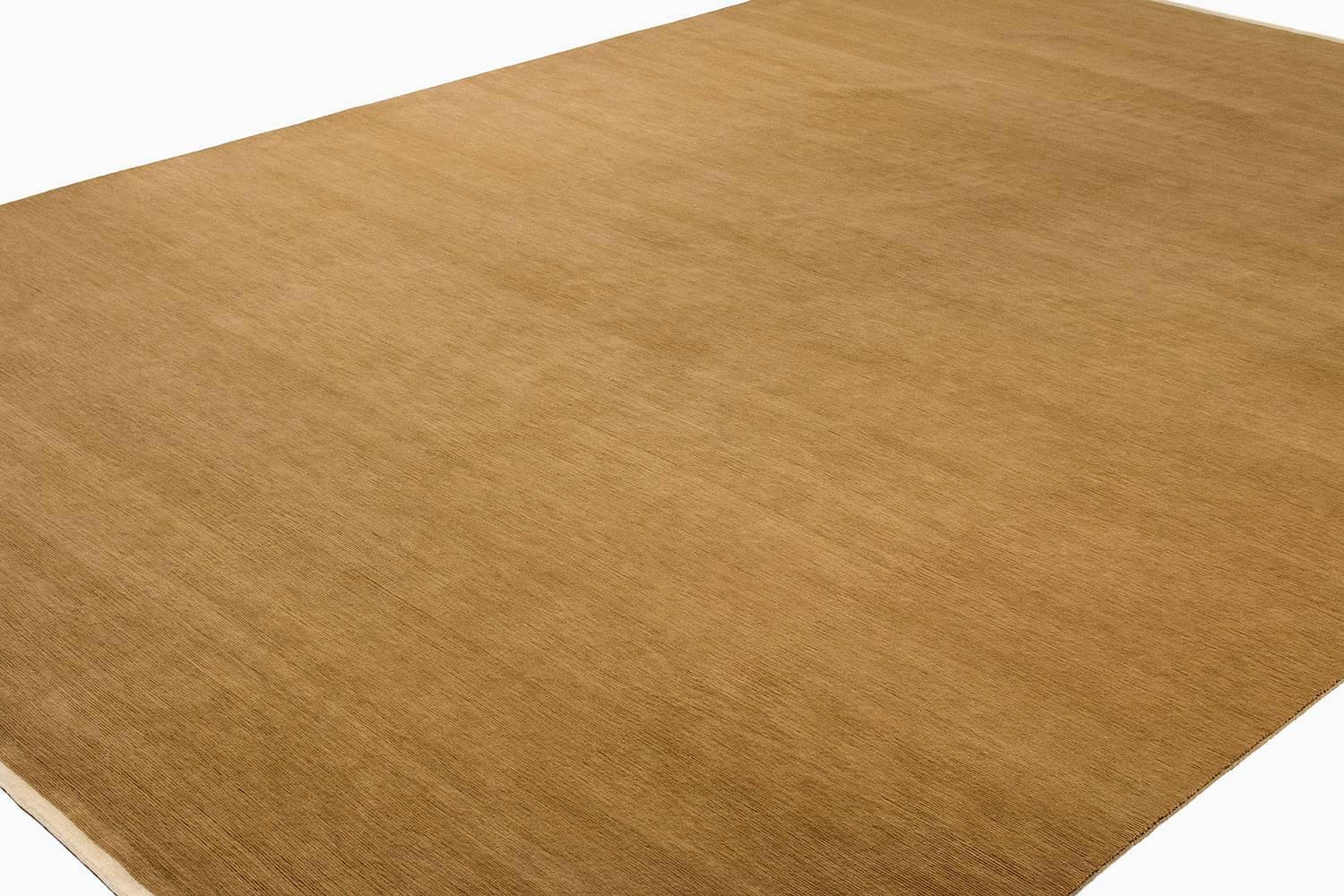 Super luxurious and soft solid mohair area rug in a cosy camel/coffee color, with end panels. 

