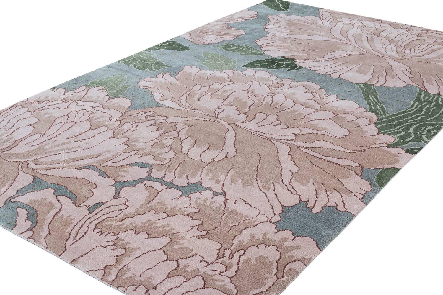 This version of the Mums design is subtle in rosy greys, blue, leafy green, and silver. The outlined petals, solid background and leaf detail makes this carpet a floral staple in any home. Original design by Joseph Carini.

All designs offered in