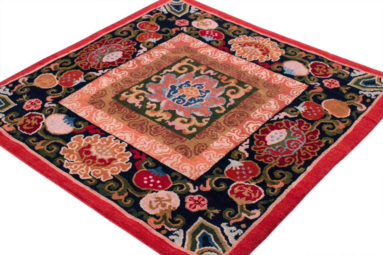 This spectacular reproduction of a small antique Tibetan mat was made with 100% Vegetable dyes made using authentic Tibetan weaving techniques. 100% Himalayan wool.