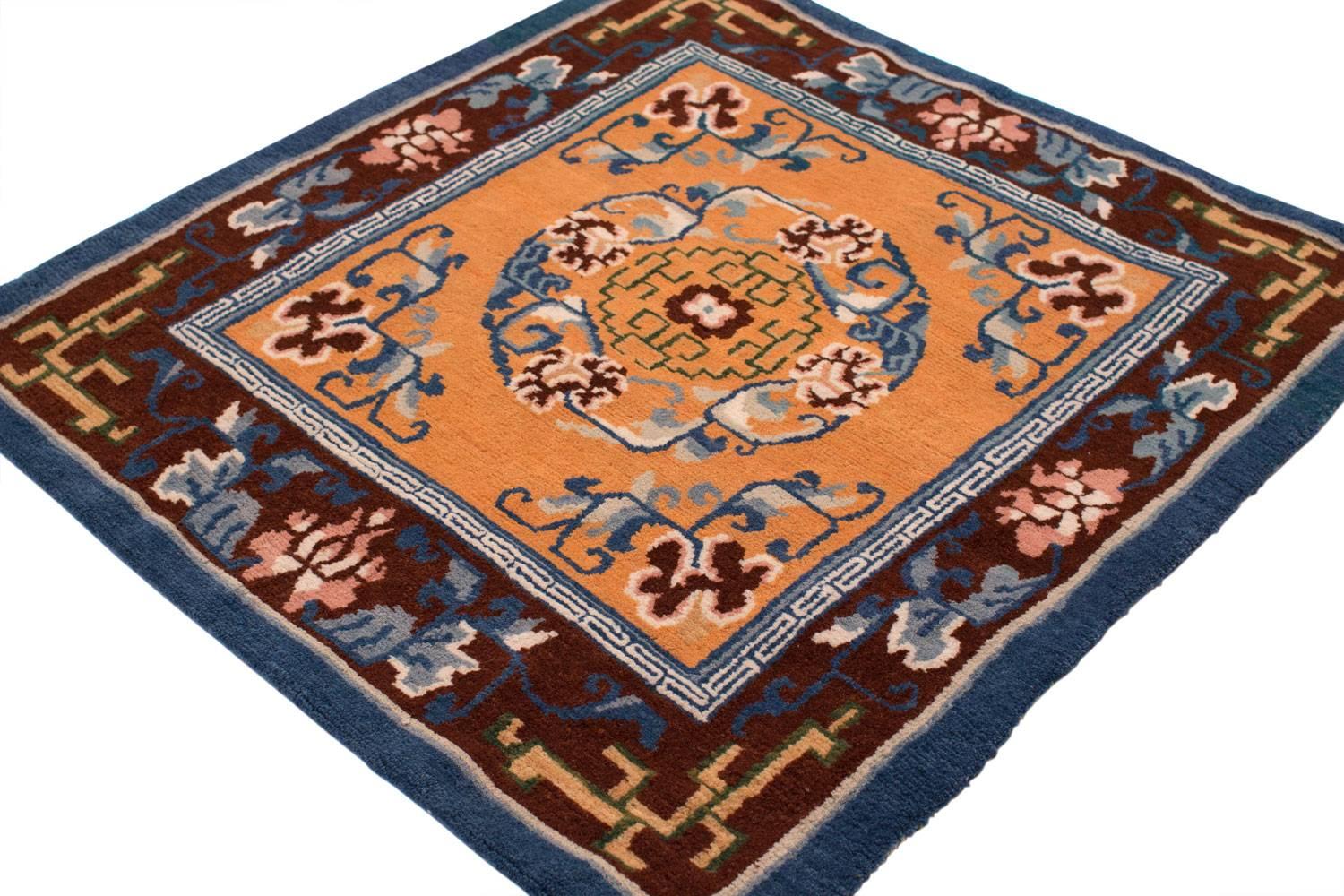 This spectacular reproduction of a small antique Tibetan mat was made with 100% Vegetable dyes made using authentic Tibetan weaving techniques. 100% Himalayan wool.